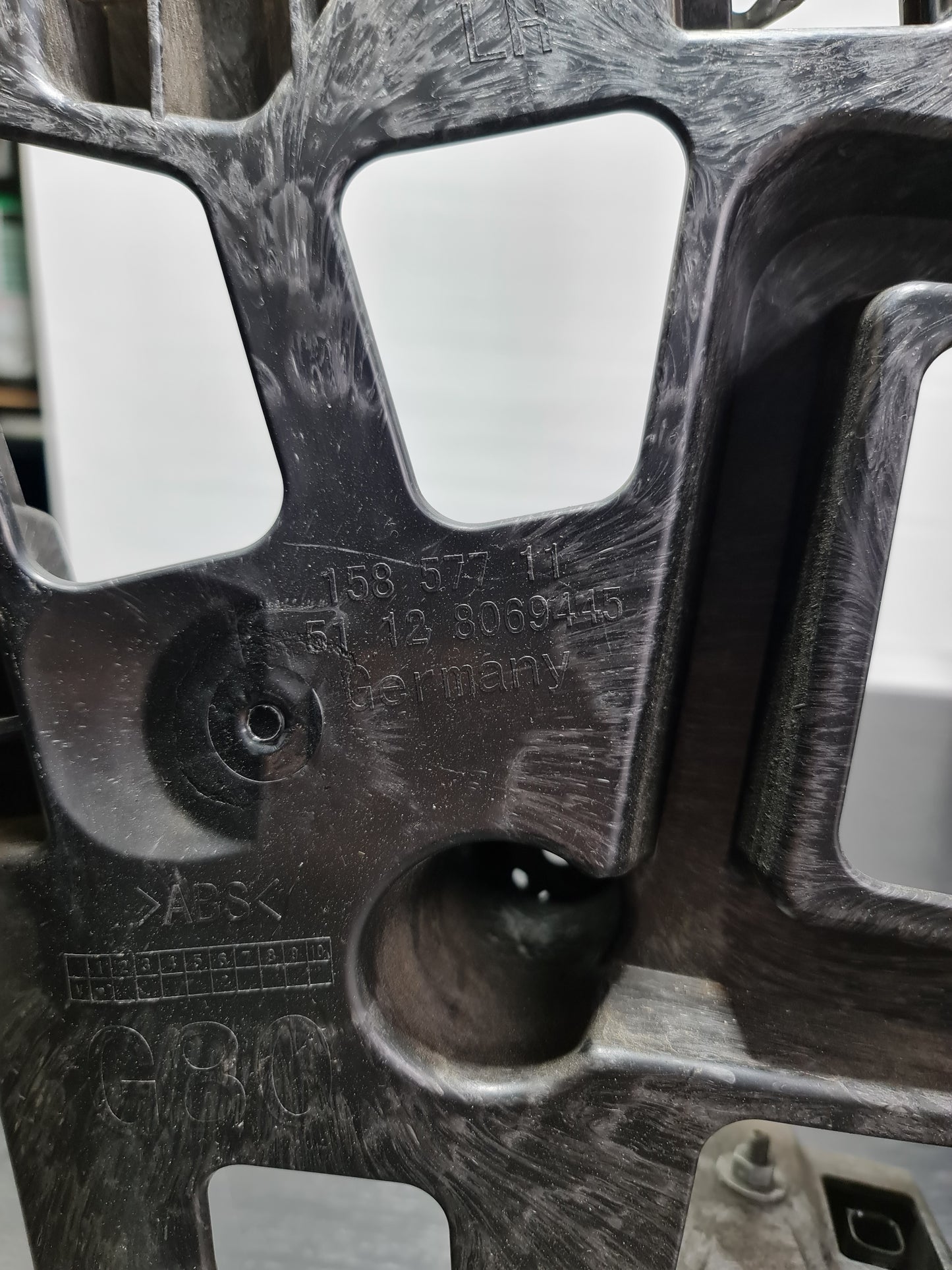 BMW G80 M3 REAR LEFT BUMPER HOLDER BRACKET 8069445 51128069445 - MPerformance.parts