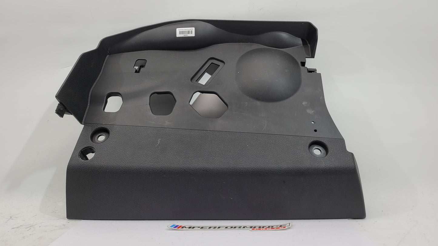 BMW 1 Series F20 F21 F23 front left lower dash cover panel trim by MPerformance.parts, showing the textured interior dashboard component.