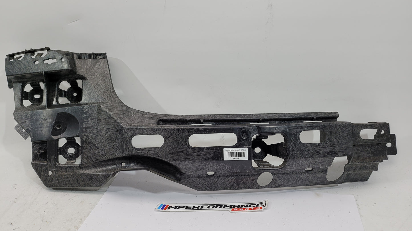 BMW M3 G80 rear left passenger side bumper bracket mount, showing the metal bracket with mounting holes and structural design.