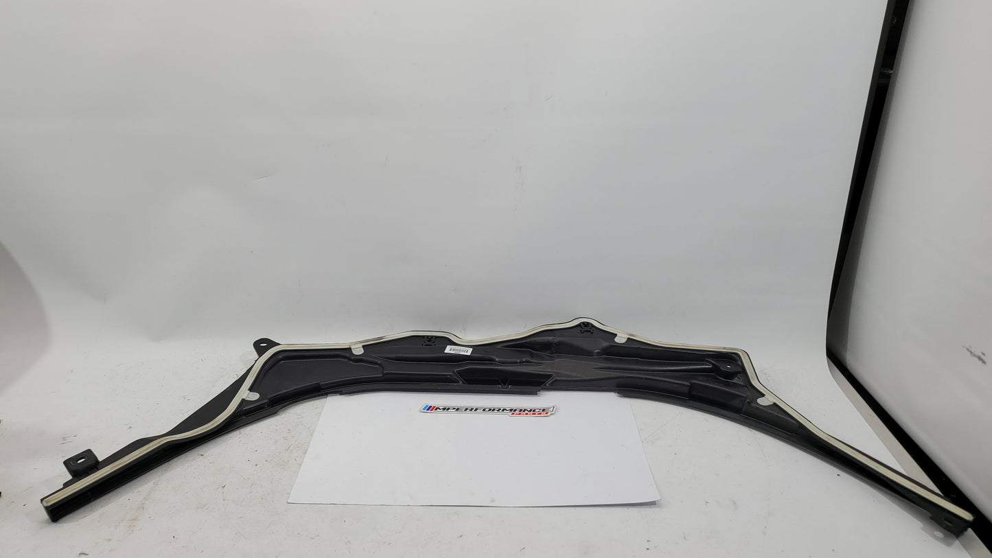 BMW M3 G8X firewall upper section cover panel by MPerformance.parts, showing the black metal engine bay cover with mounting details.