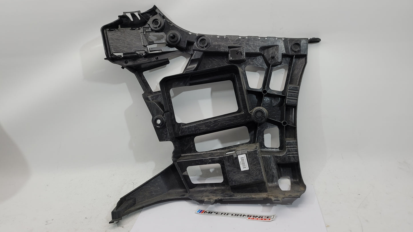 BMW M3 M4 G80 G82 rear left bumper corner bracket by MPerformance.parts, showing the metal mounting component with bolt holes.
