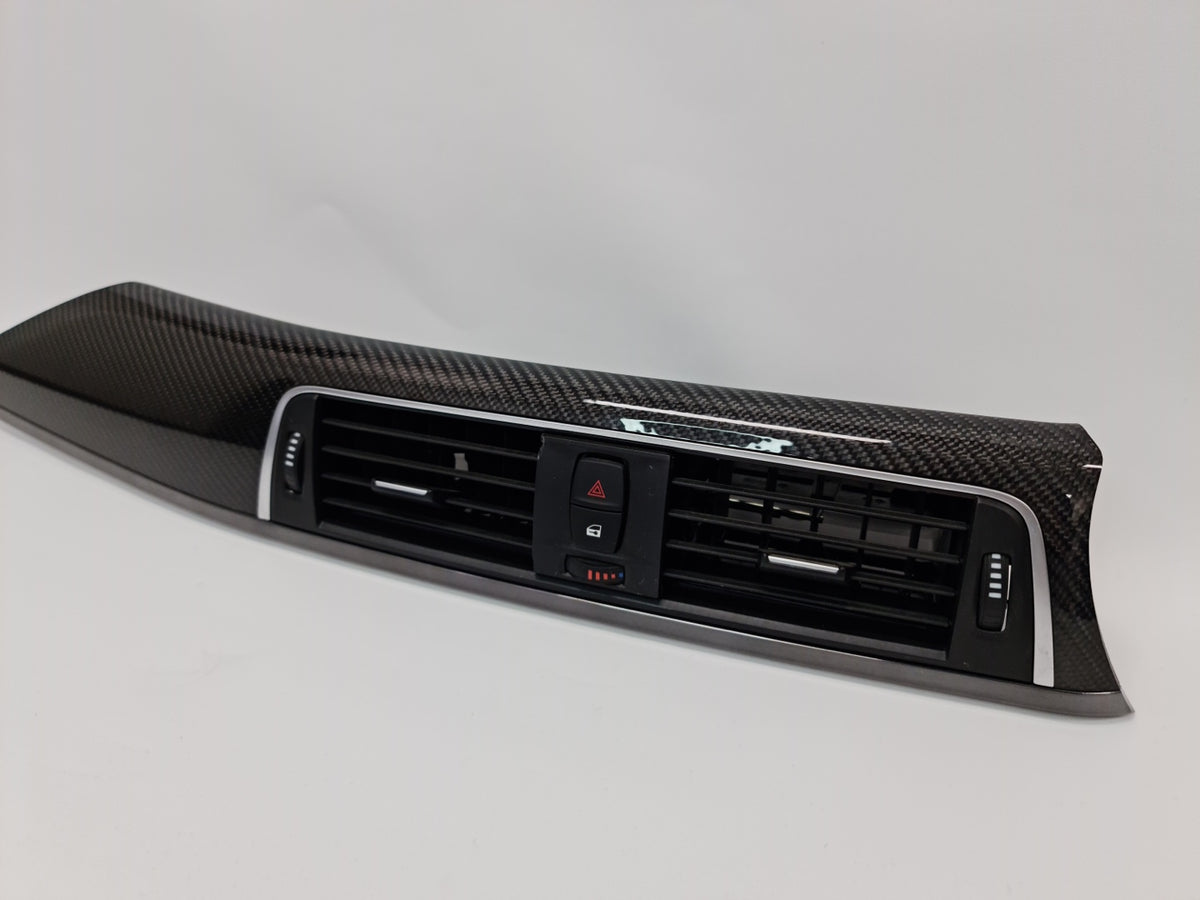 BMW M3 M4 F80 F82 F83 carbon interior trim air vents, close-up showing sleek black carbon finish and precise design details.