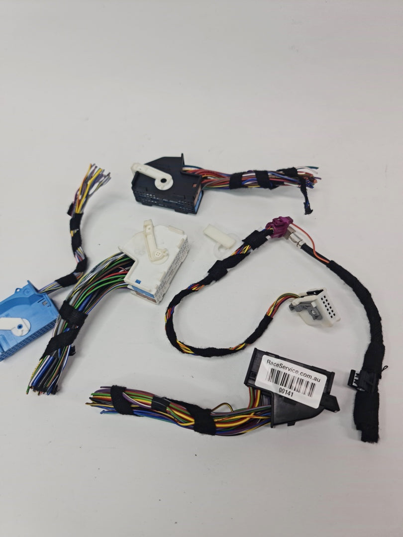 F80 M3 harness plugs by MPerformance.parts, close-up of black electrical connectors designed for BMW F80 M3 wiring system.
