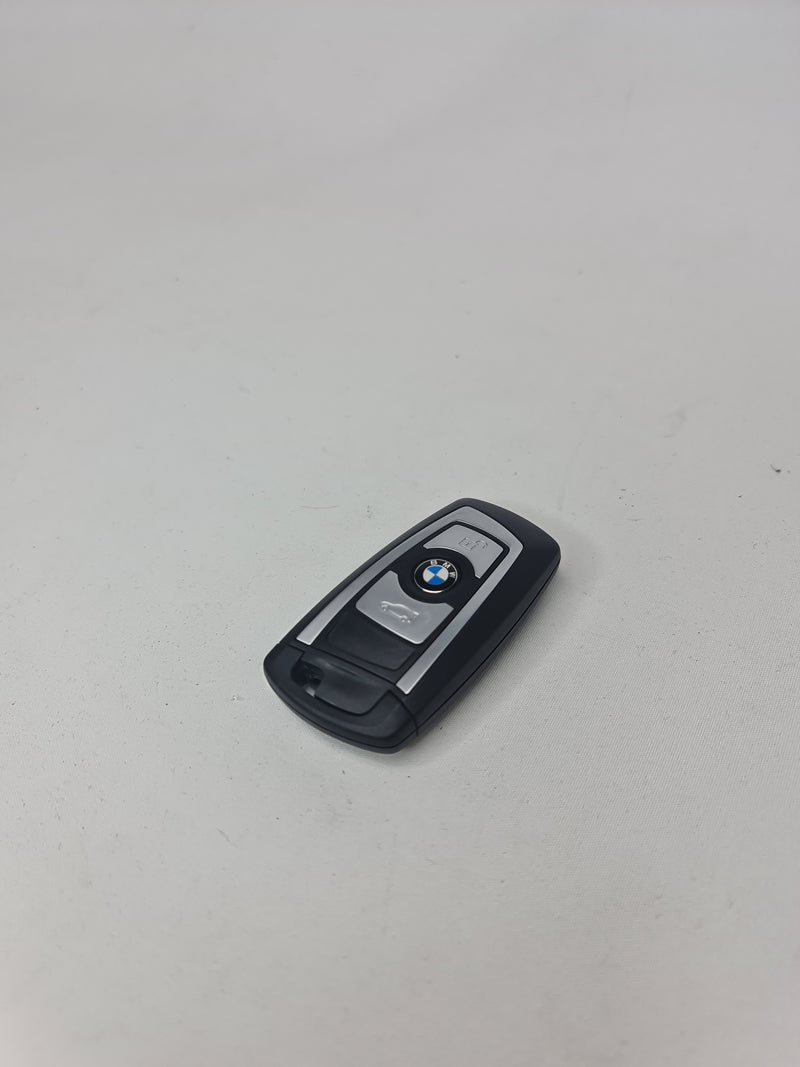 OEM BMW F80 M3 key with black plastic casing and silver BMW logo, designed for F80 M3 models.