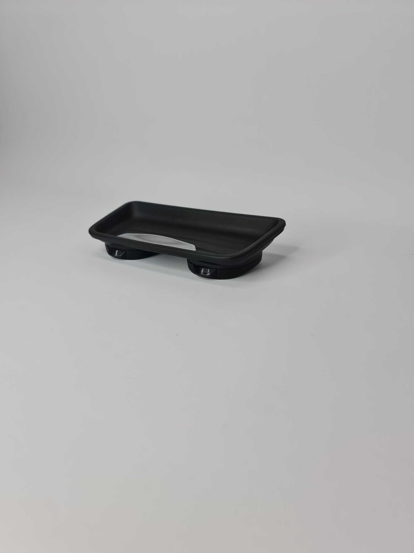 BMW oddments tray cup holder insert with multiple compartments for vehicle interior storage.