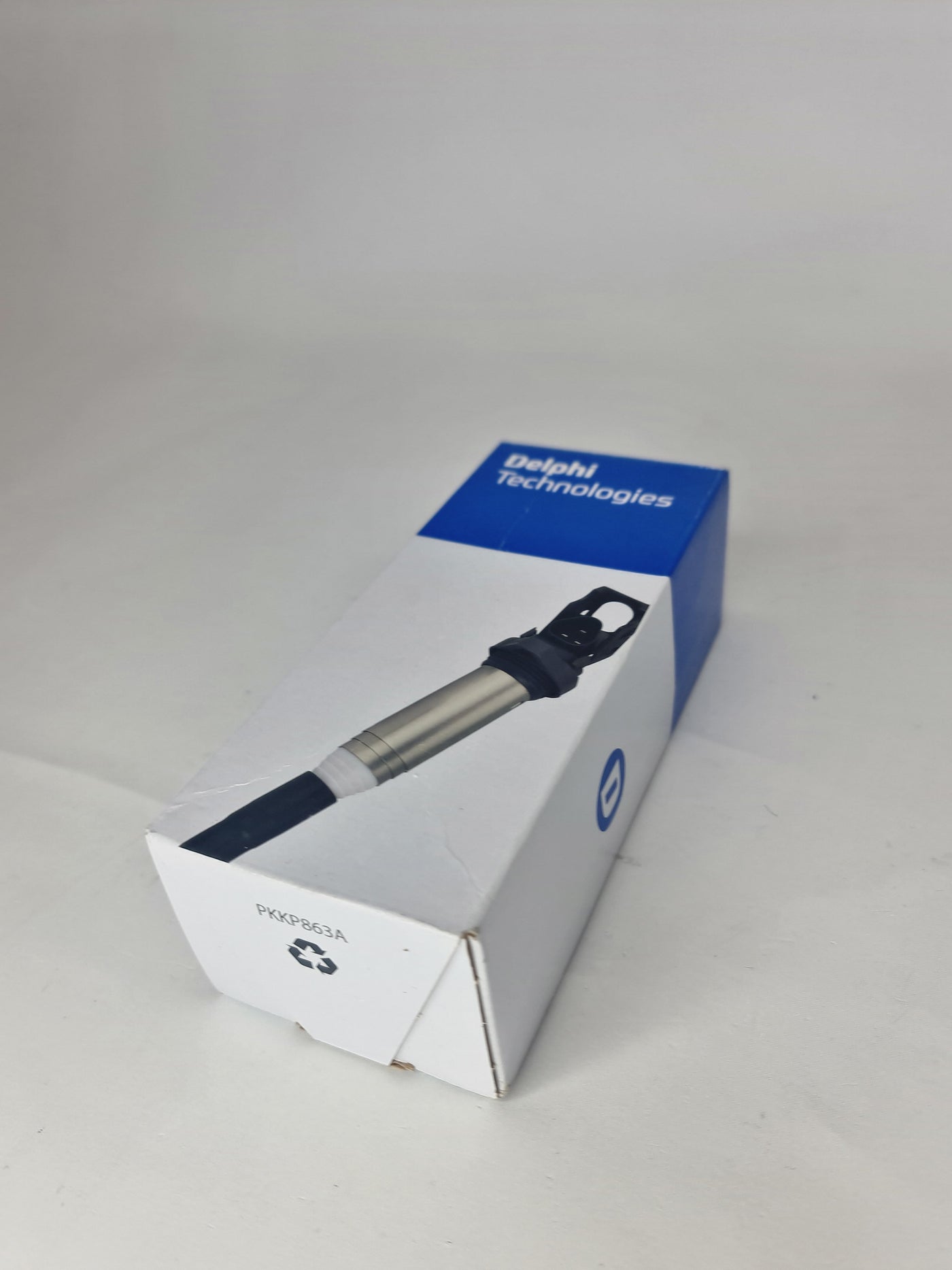 Delphi GN10571-11B1 ignition coil for BMW 1-7 series and Mini Cooper, showing the coil with connector and mounting base.