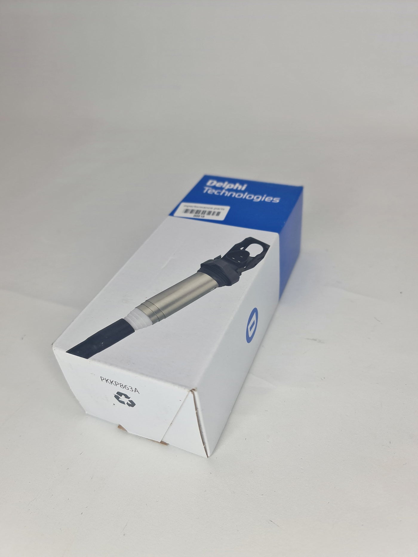 Delphi GN10571-11B1 ignition coil for BMW 1-7 Series and Mini Cooper, showing the coil with connectors and mounting points.