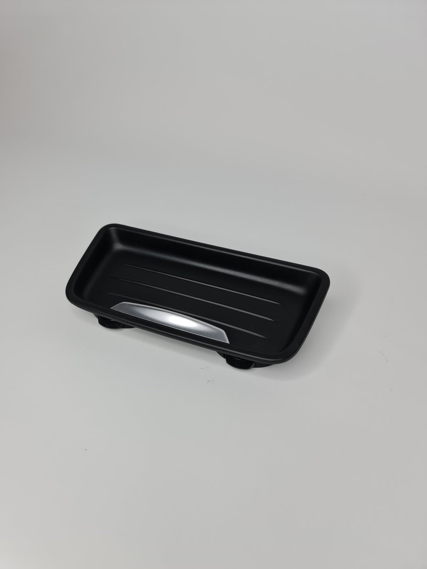 BMW oddments tray cup holder insert, part number 51169232068, fits in the vehicle's interior for convenient storage.