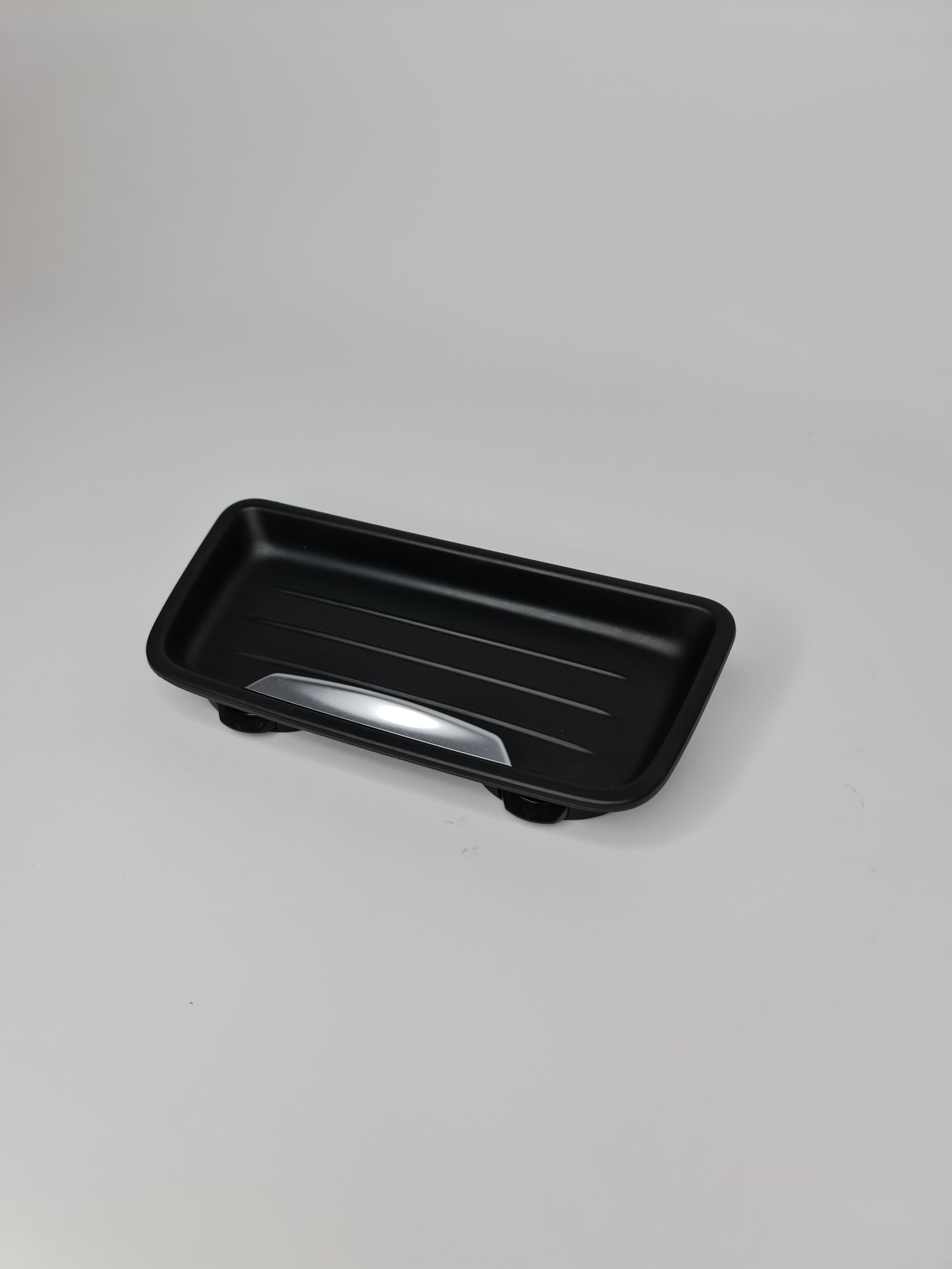 BMW oddments tray cup holder insert, part number 51169232068, fits in the vehicle's interior for convenient storage.