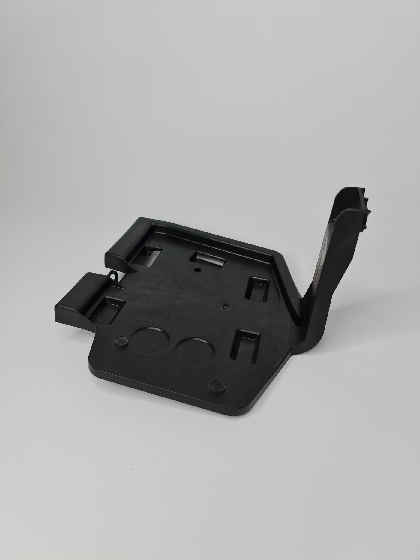 BMW 328i F30 rear left trunk lid tailgate trim bracket, OEM part 51477295817, close-up view showing mounting details.