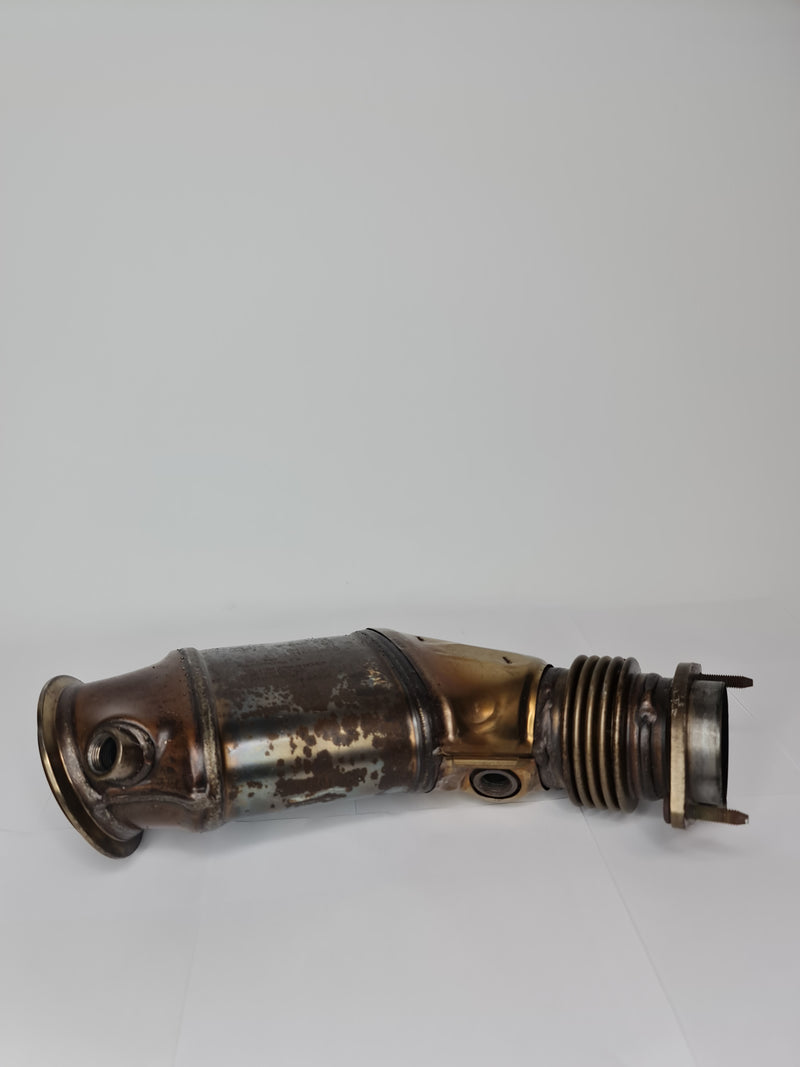 BMW catalytic converter 2015-2020 model, part 18-32-7-848-044, with metal and ceramic components, shown in the image.