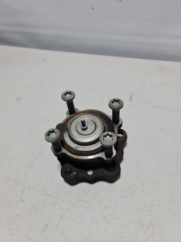 BMW front wheel hub with bearing, model 2015-2020, showing the metallic hub assembly with mounting points and bearing details.