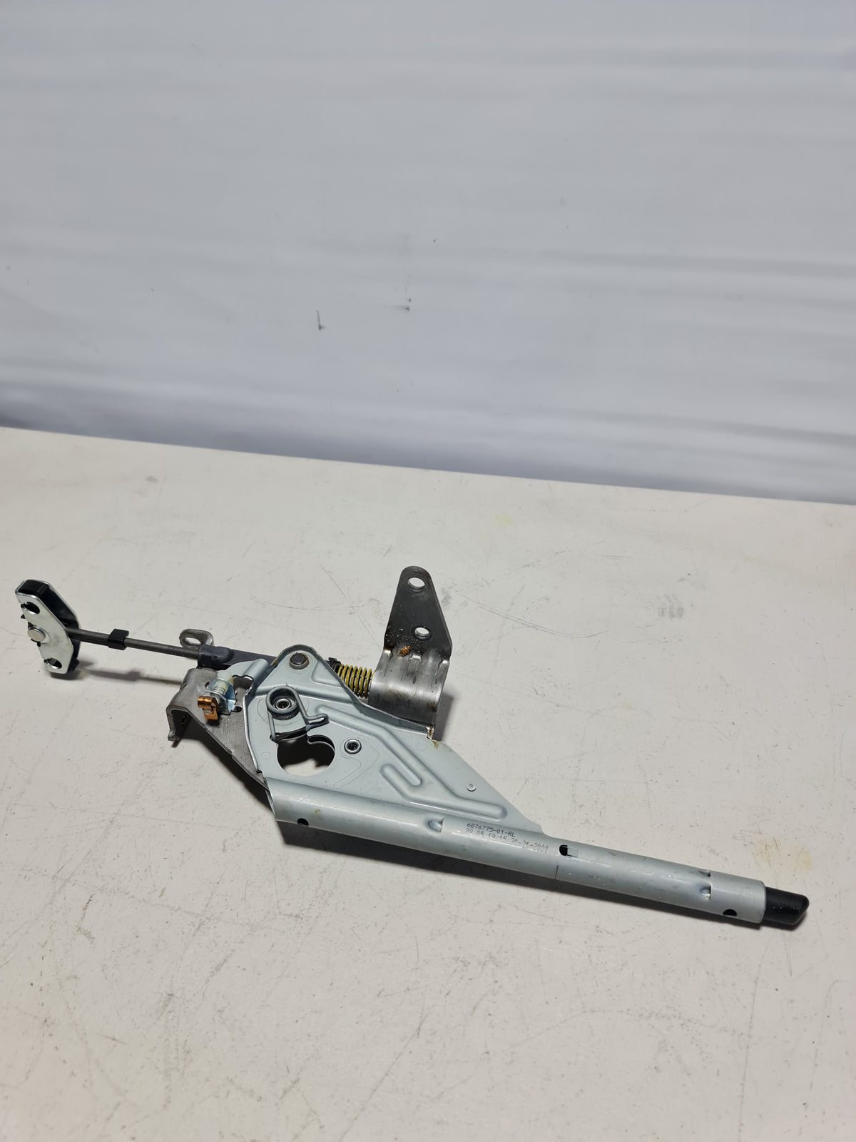 Genuine used BMW handbrake lever for M4 F82 and M3 F80 models, part numbers 34406799102 and 34406876775, shown in image.
