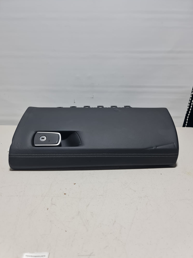 F80 M3 black leather glove box interior with sleek finish, designed for MPerformance.parts F80 M3 vehicle.