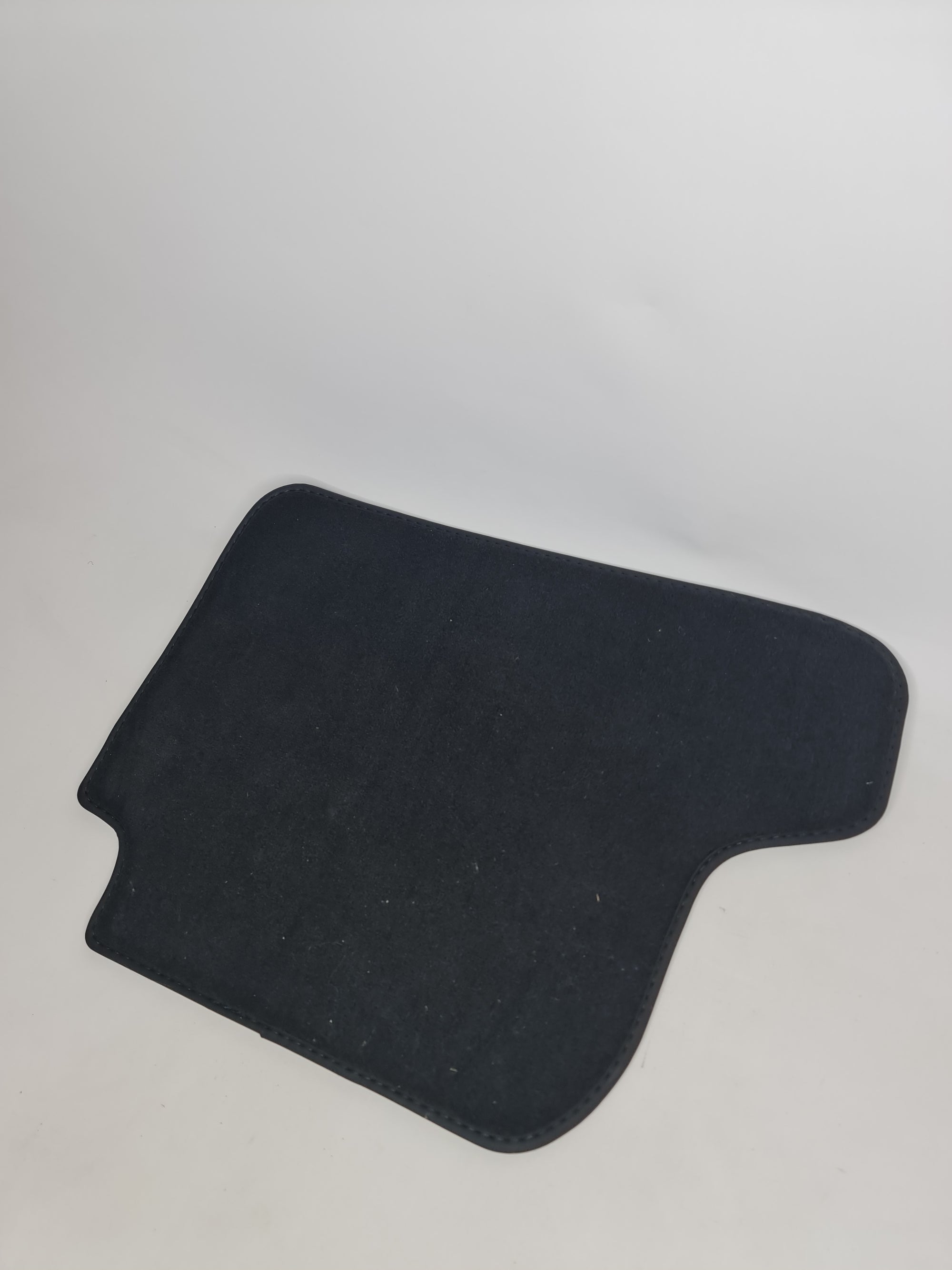 F82 M4 rear right floor mat by MPerformance.parts, black rubber mat with textured surface for vehicle interior protection.