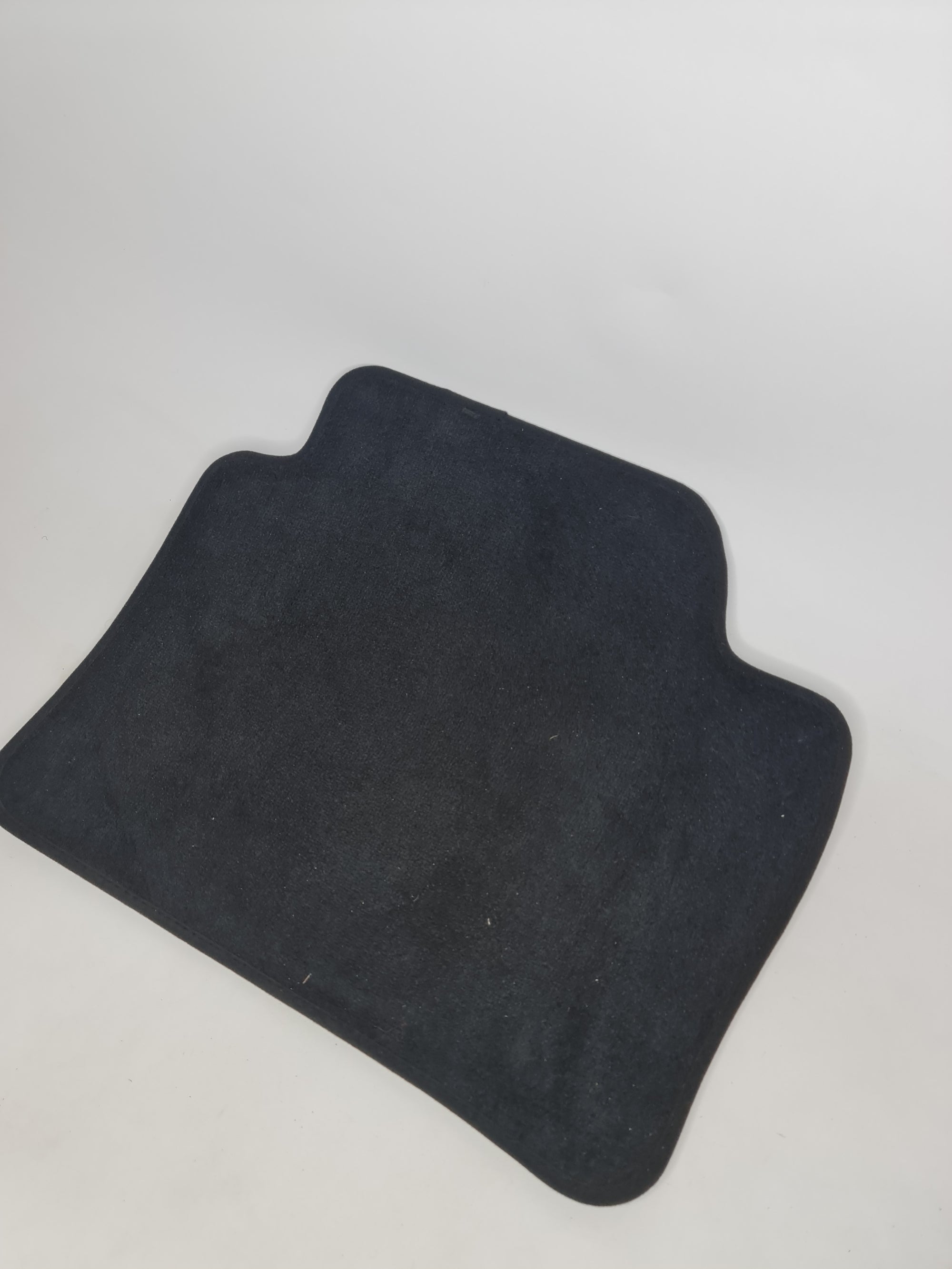 F80 M3 rear right floor mat by MPerformance.parts, black rubber mat with logo, designed for car interior protection.