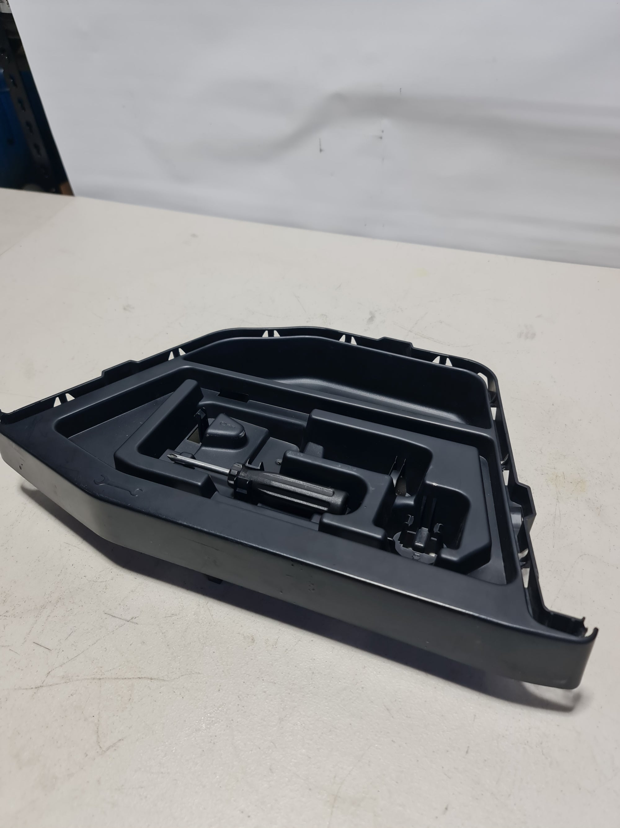 BMW 4 Series Coupe F32 F82 M4 rear right interior trim cover, driver side, in black with textured finish.