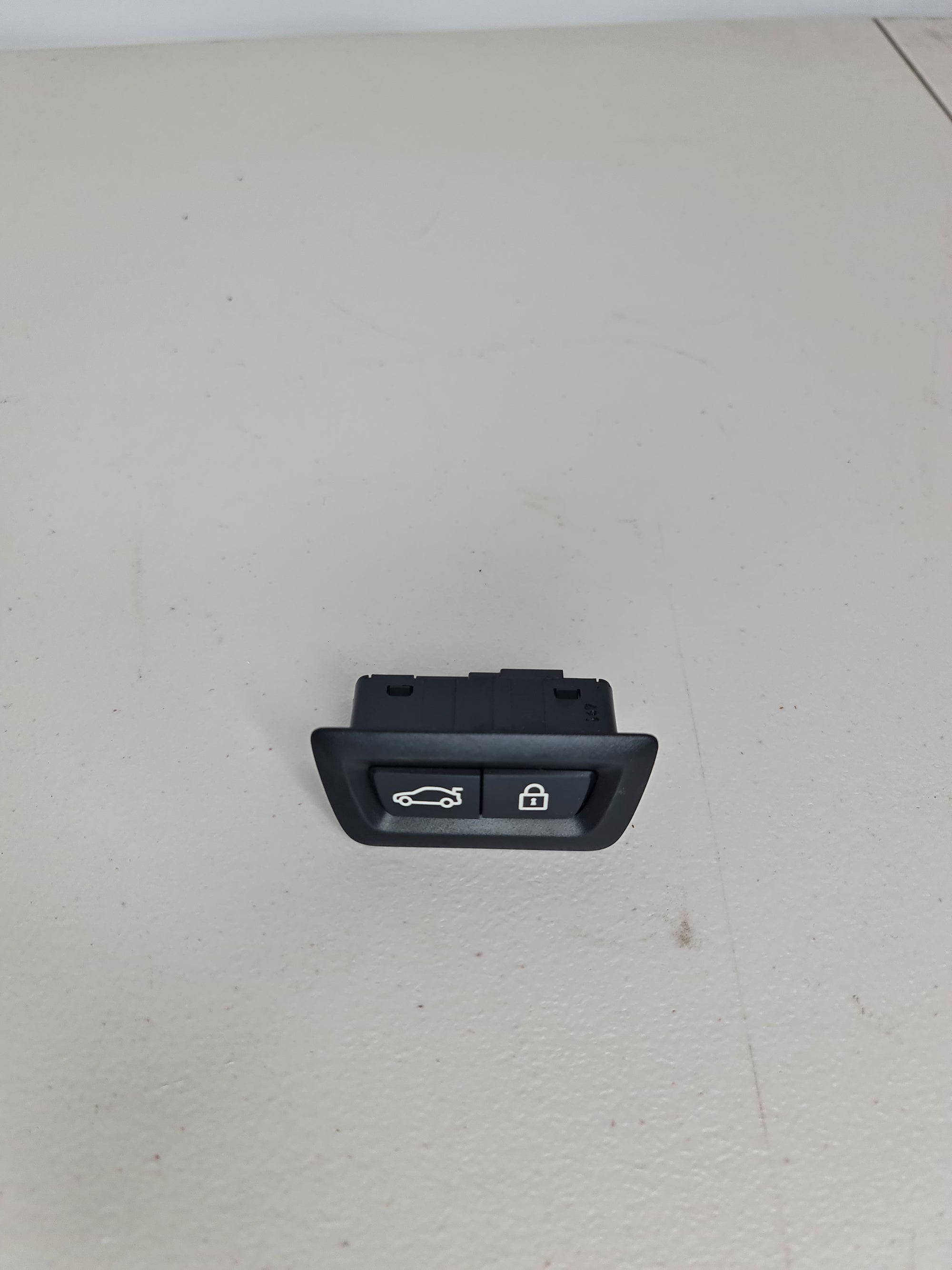 BMW G80 tailgate switch by MPerformance.parts, showing the car's tailgate switch with detailed buttons and connectors.
