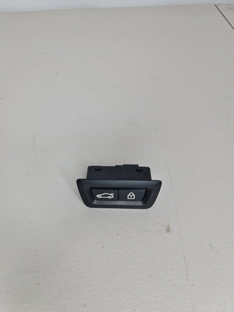 BMW G80 tailgate switch by MPerformance.parts, showing the car's tailgate switch with detailed buttons and connectors.