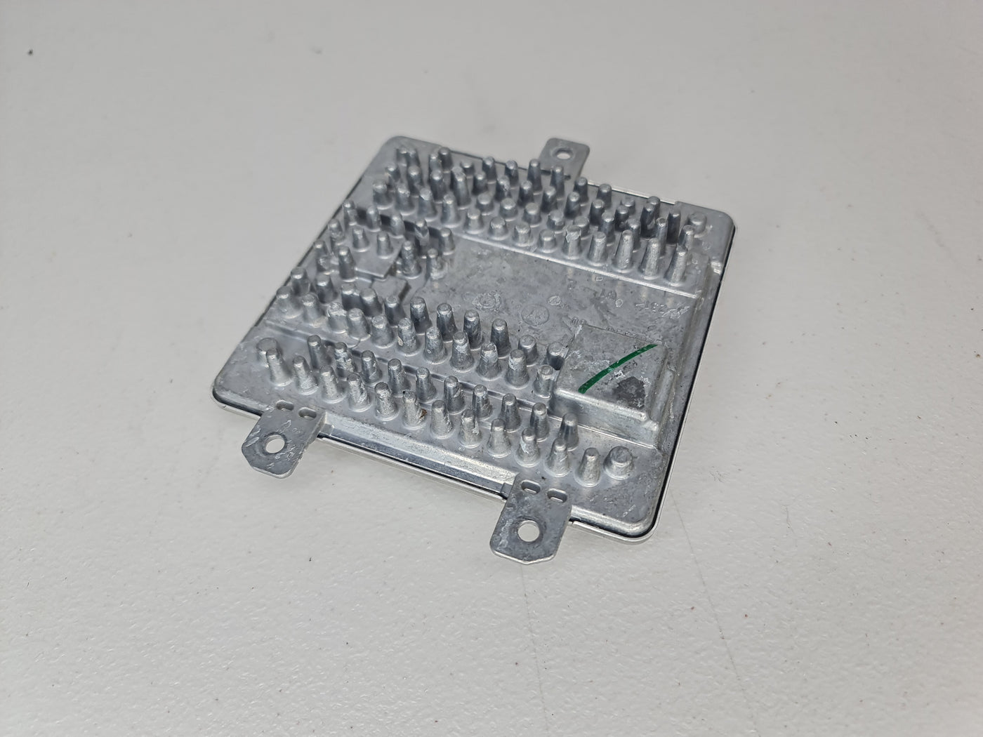 BMW G01 X3 G02 X4 G80 M3 M82/83 M4 laser headlight control unit module, close-up of MPerformance.parts component.