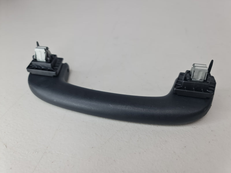 Black G80 roof grab handle arm holder by MPerformance.parts, featuring a sturdy design for vehicle interior support.