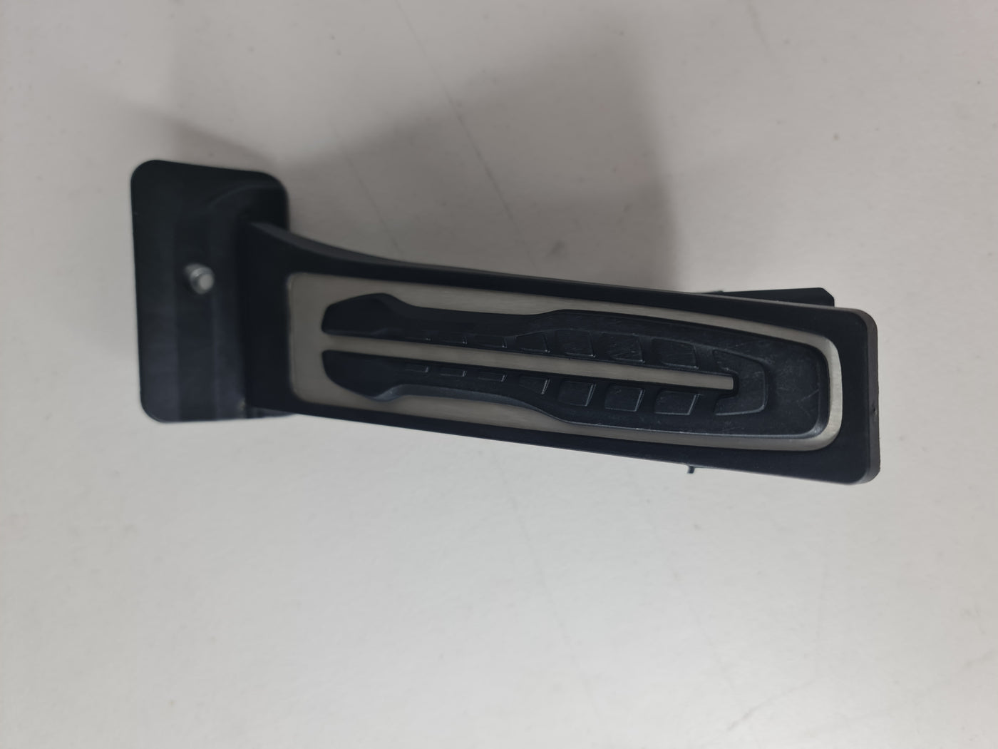 BMW 3 Series G20 MPerformance.parts pedal, black metal with textured surface for accelerator or brake, close-up view.