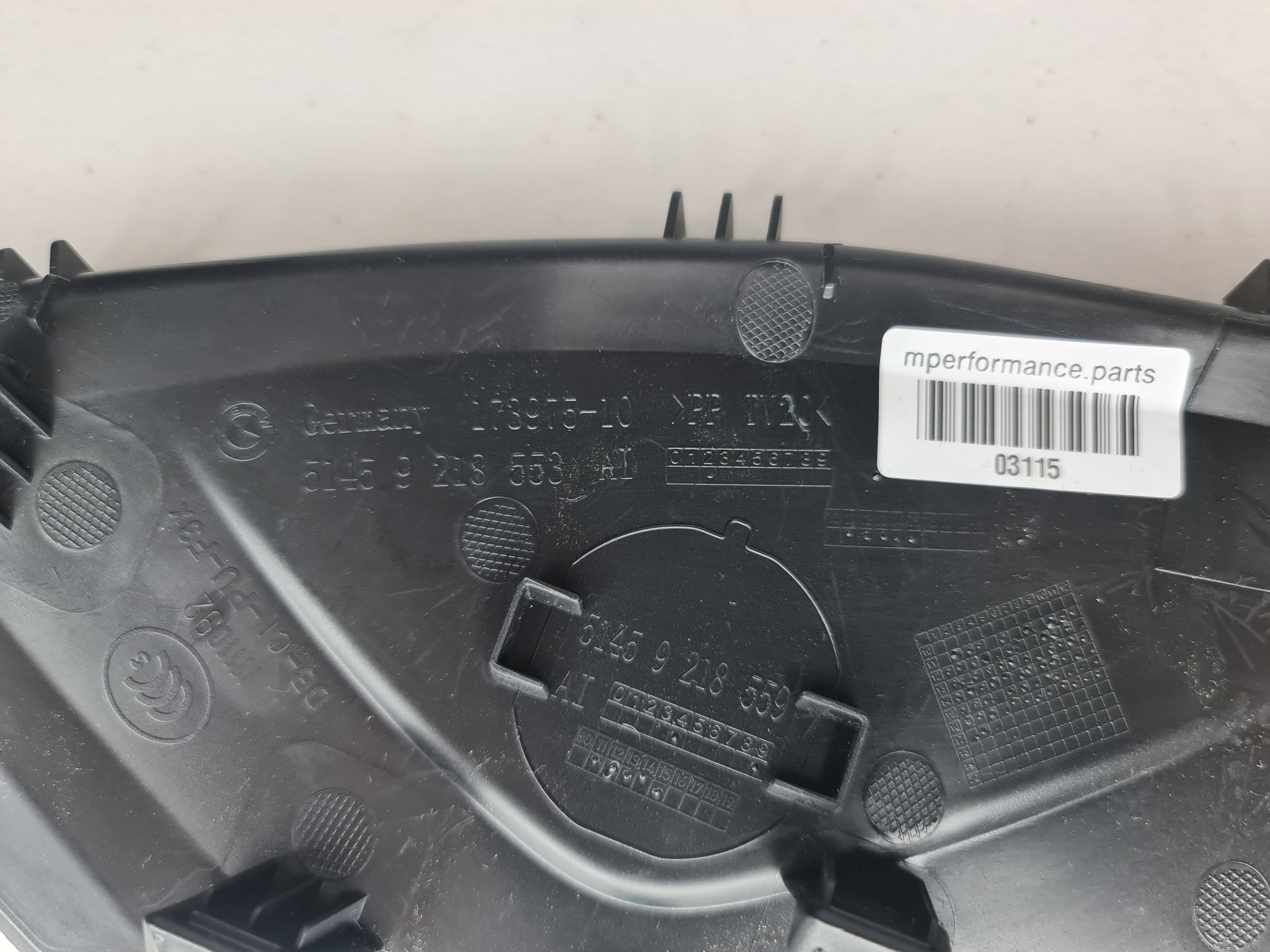 BMW 3 Series F30 2012 interior side trim panel with airbag switch, black plastic cover, and branding details.