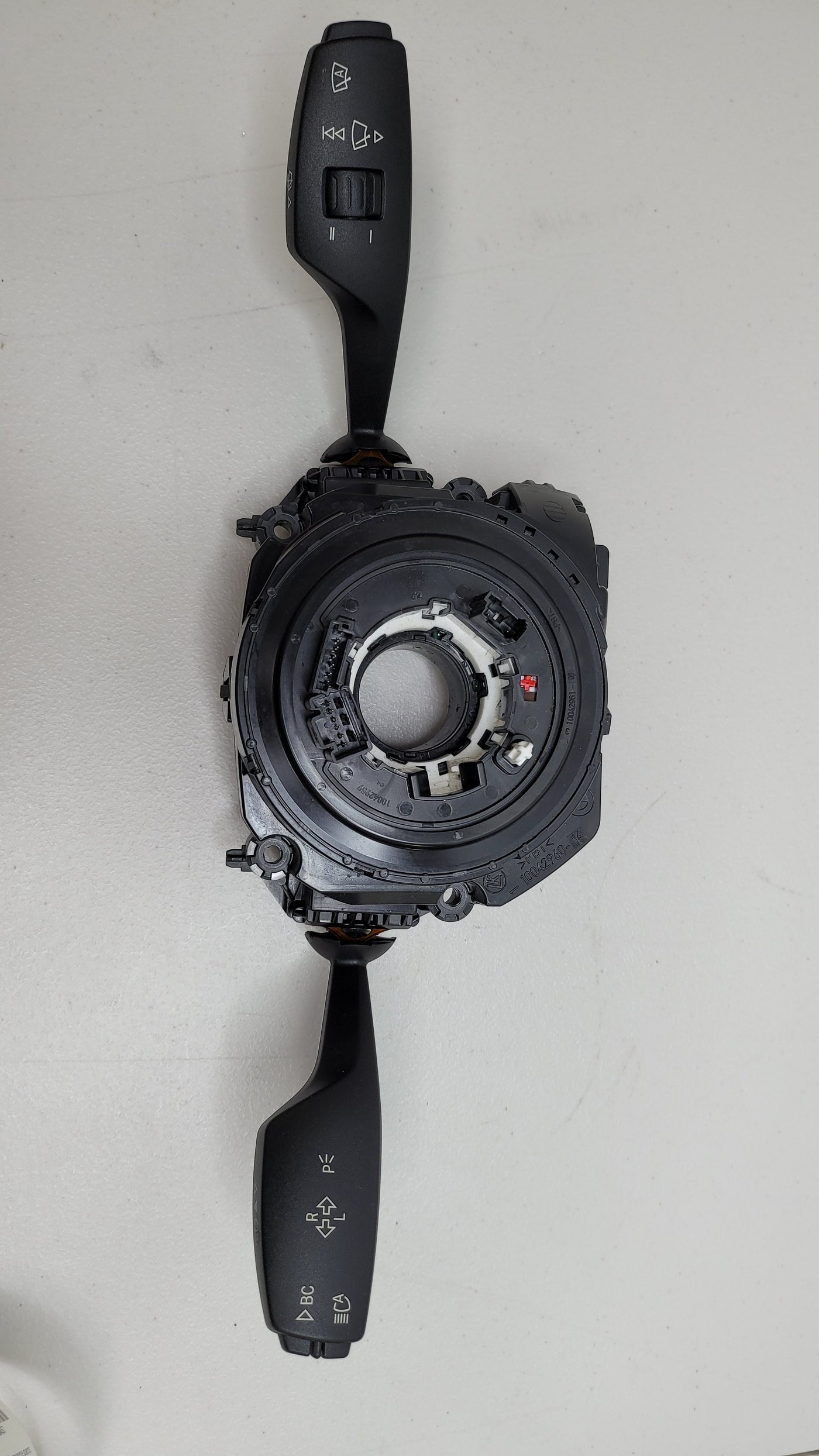BMW F80 M3 steering angle clock spring switch unit by MPerformance.parts, shown in the image with wiring and connector details.