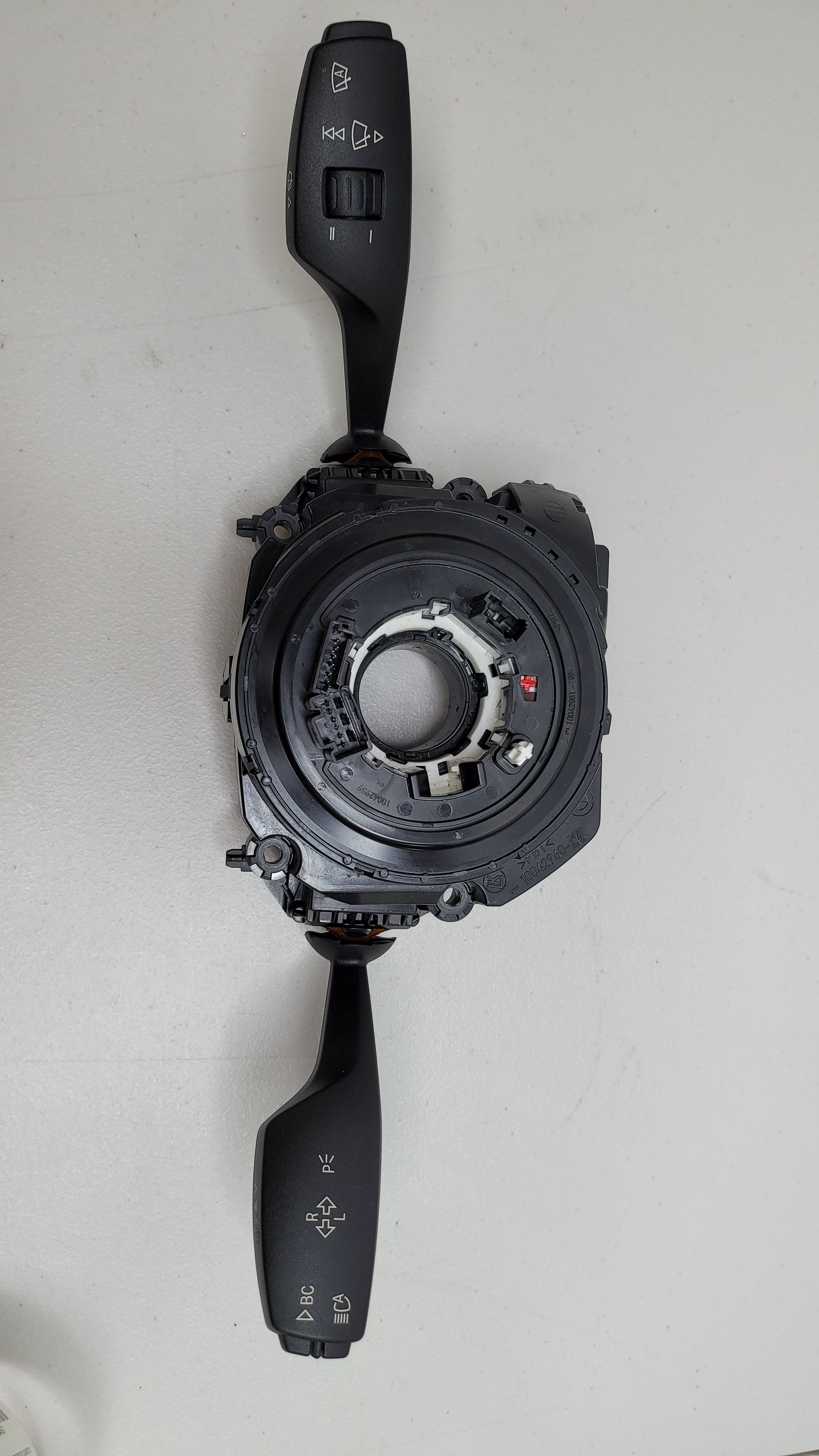 BMW F80 M3 steering angle clock spring switch unit by MPerformance.parts, shown in the image with wiring and connector details.