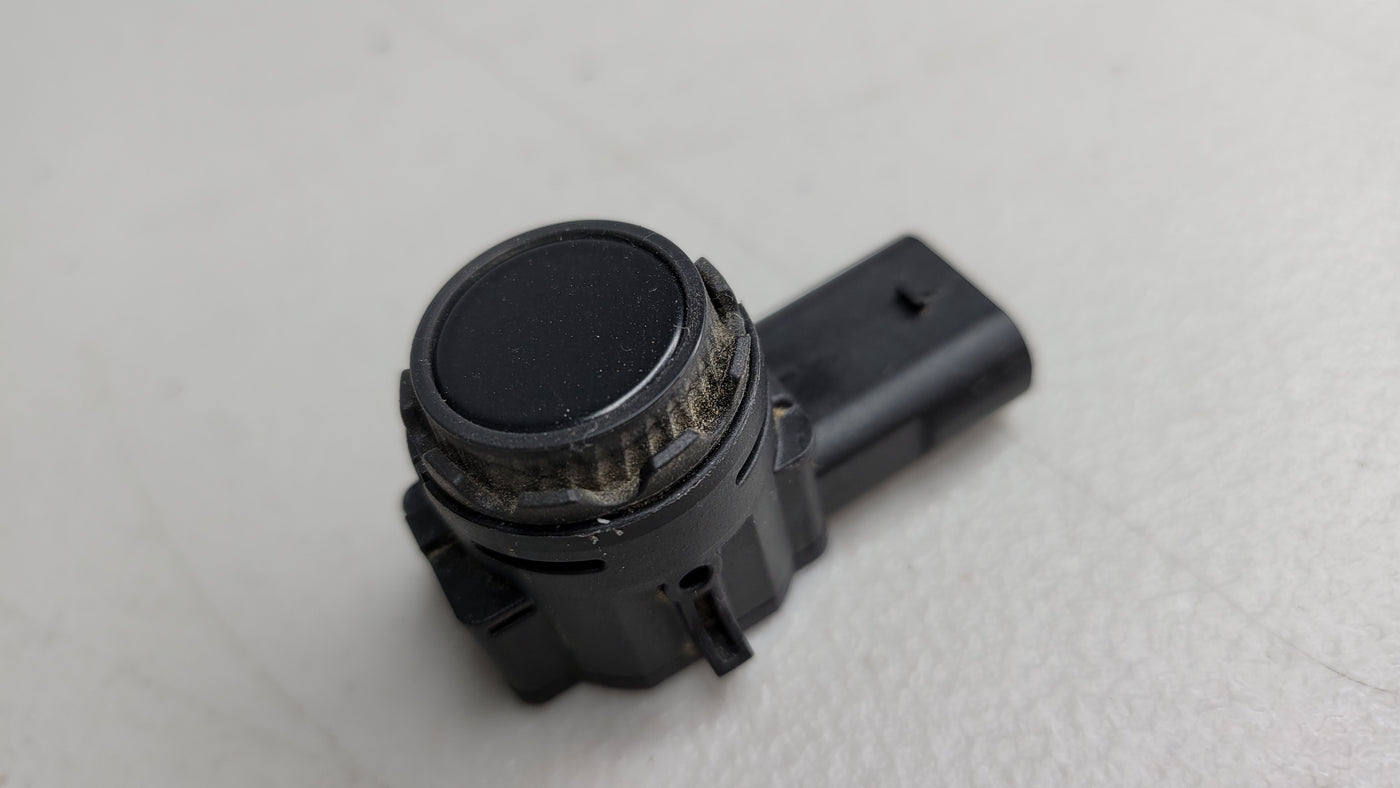 BMW PDC bumper parking ultrasonic sensor by MPerformance.parts, showing the sensor component for 2, 3, 5, 7 Series, X5, X6, X7 models