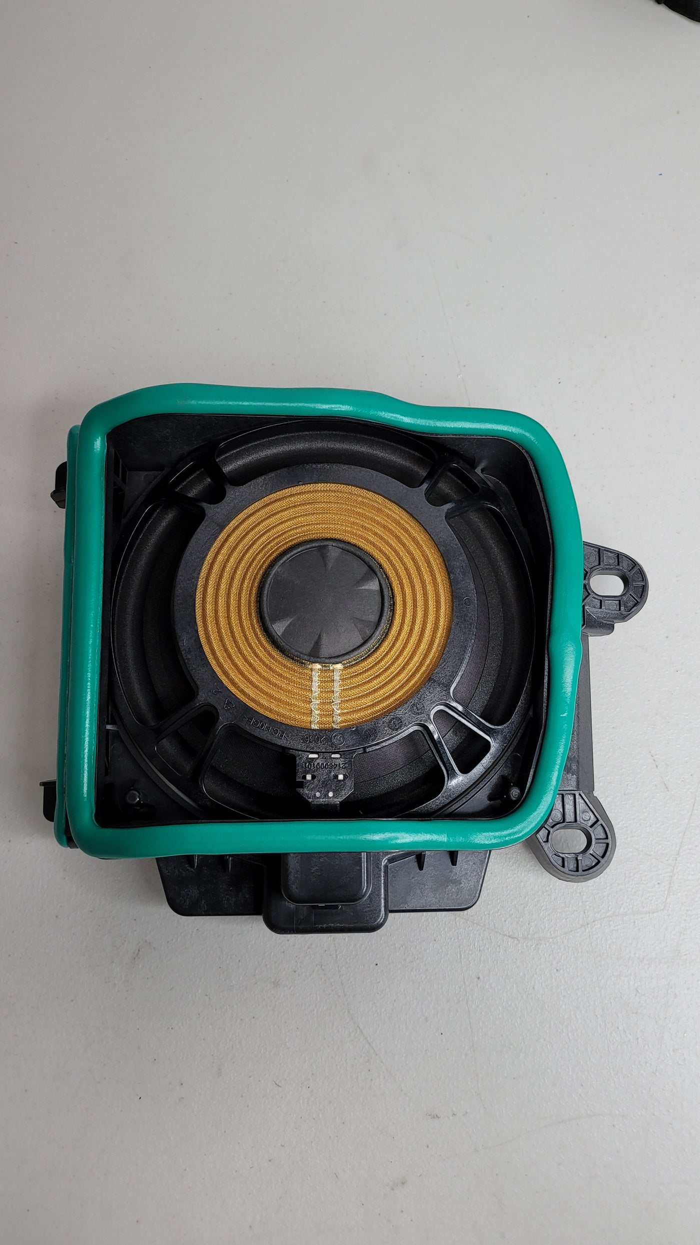 BMW M3 G80 front under seat speaker, OEM part 65132622490, black speaker with MPerformance.parts branding visible.