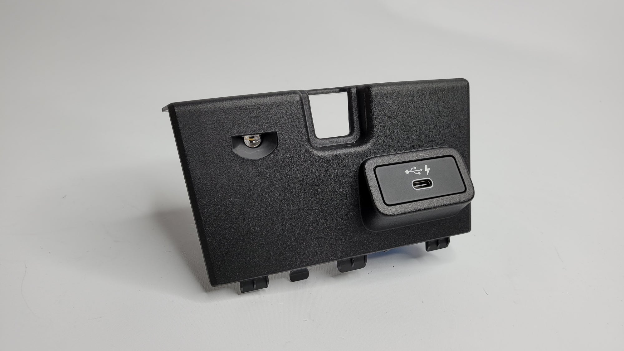 BMW M3 G80 center console insert trim with integrated USB port, made by MPerformance.parts, shown in the image.