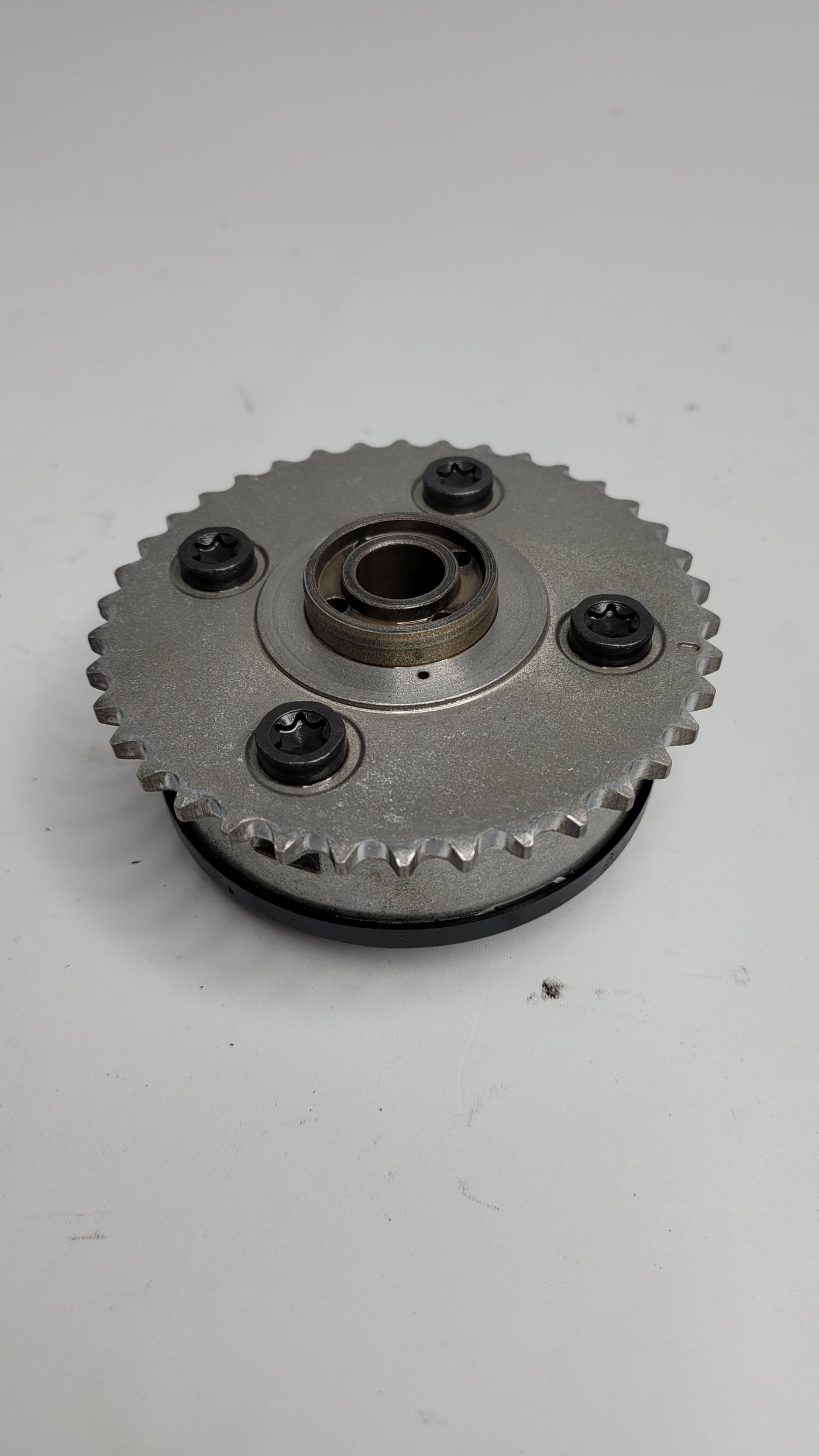 MPerformance.parts inlet camshaft adjustment unit labeled 7583207, shown in close-up with detailed mechanical components.