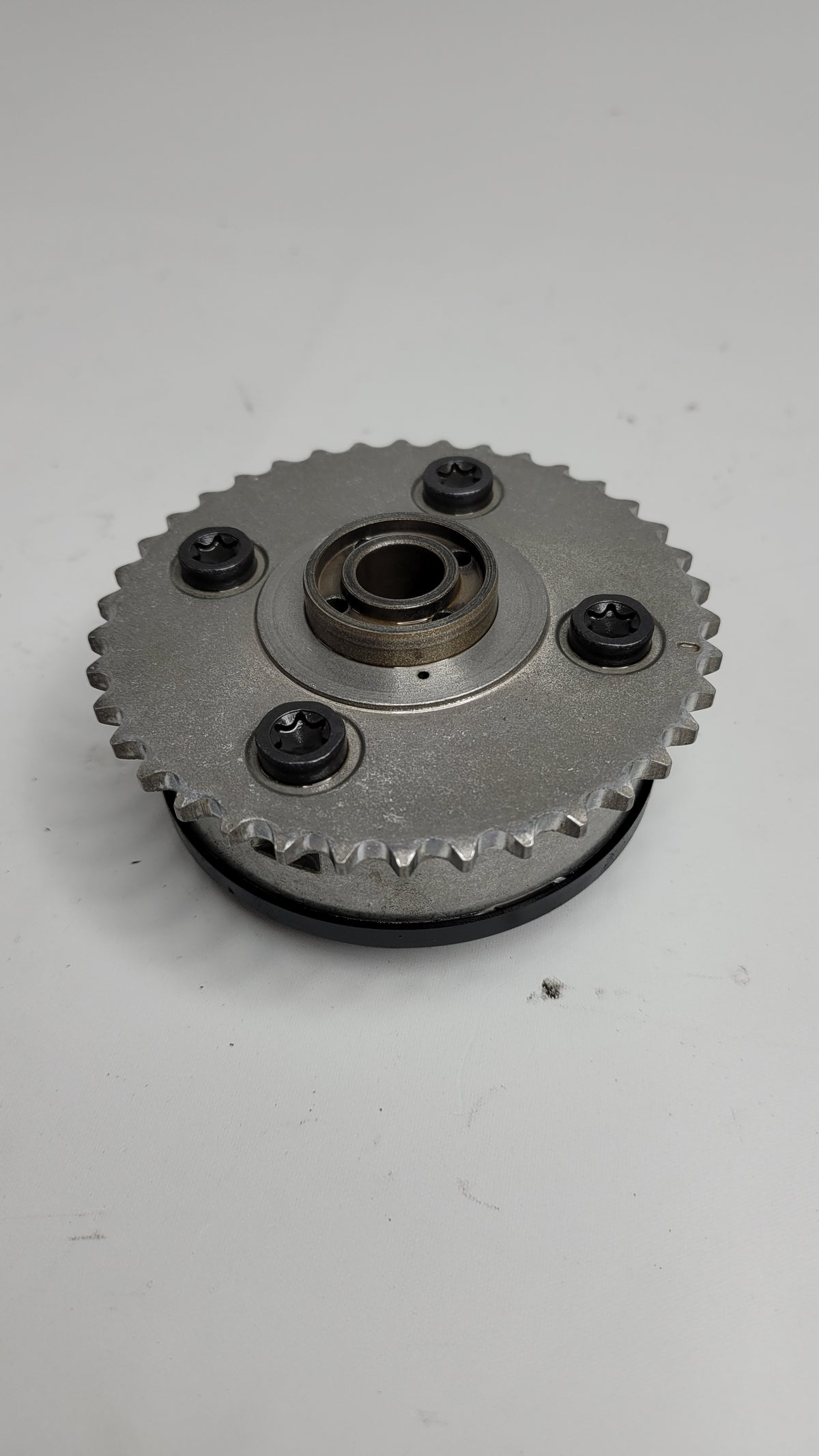 MPerformance.parts inlet camshaft adjustment unit labeled 7583207, shown in close-up with detailed mechanical components.