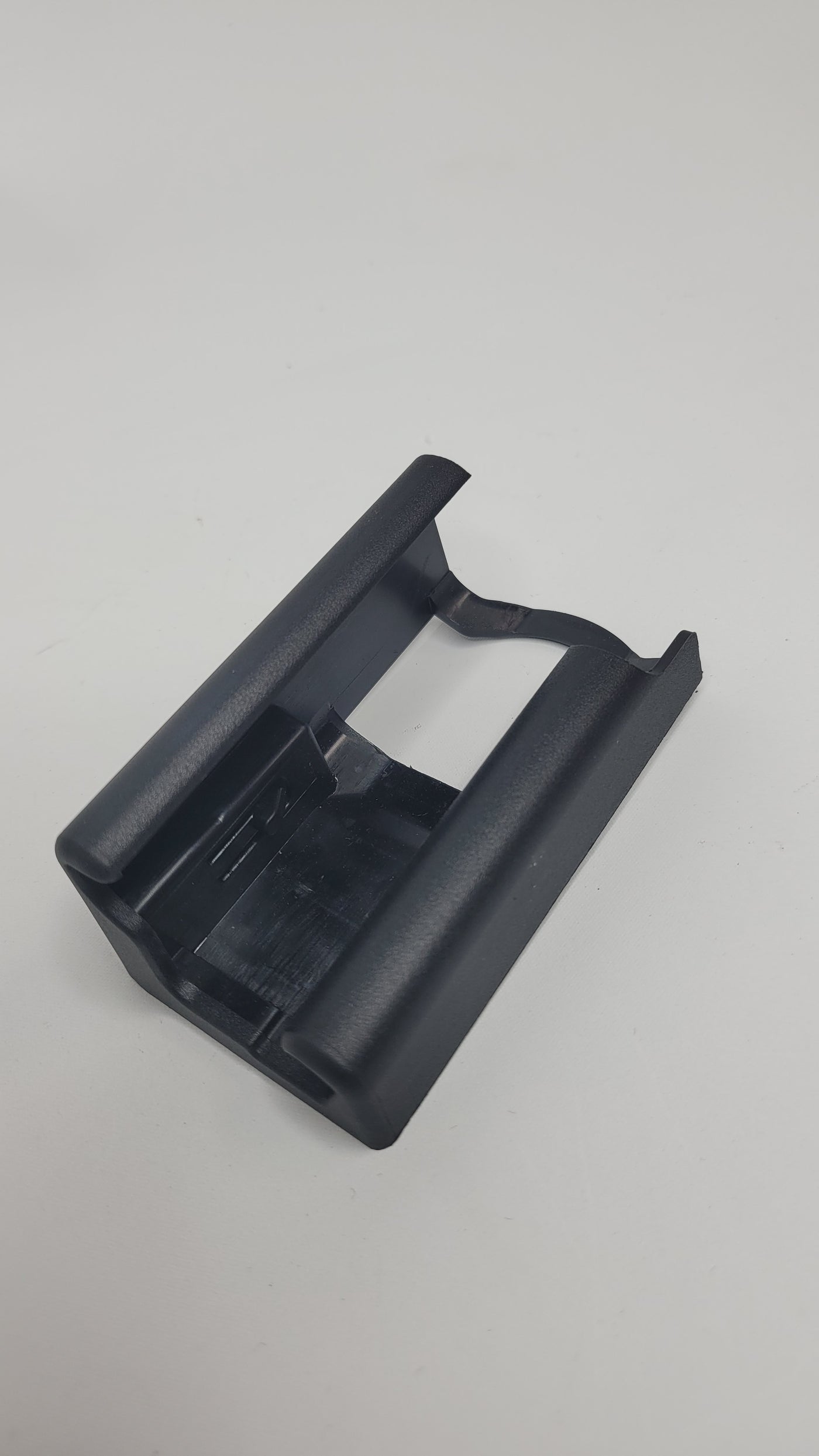 Rear left seat rail protective cap for BMW G80 M3, MPerformance.parts, shown on a car seat assembly.