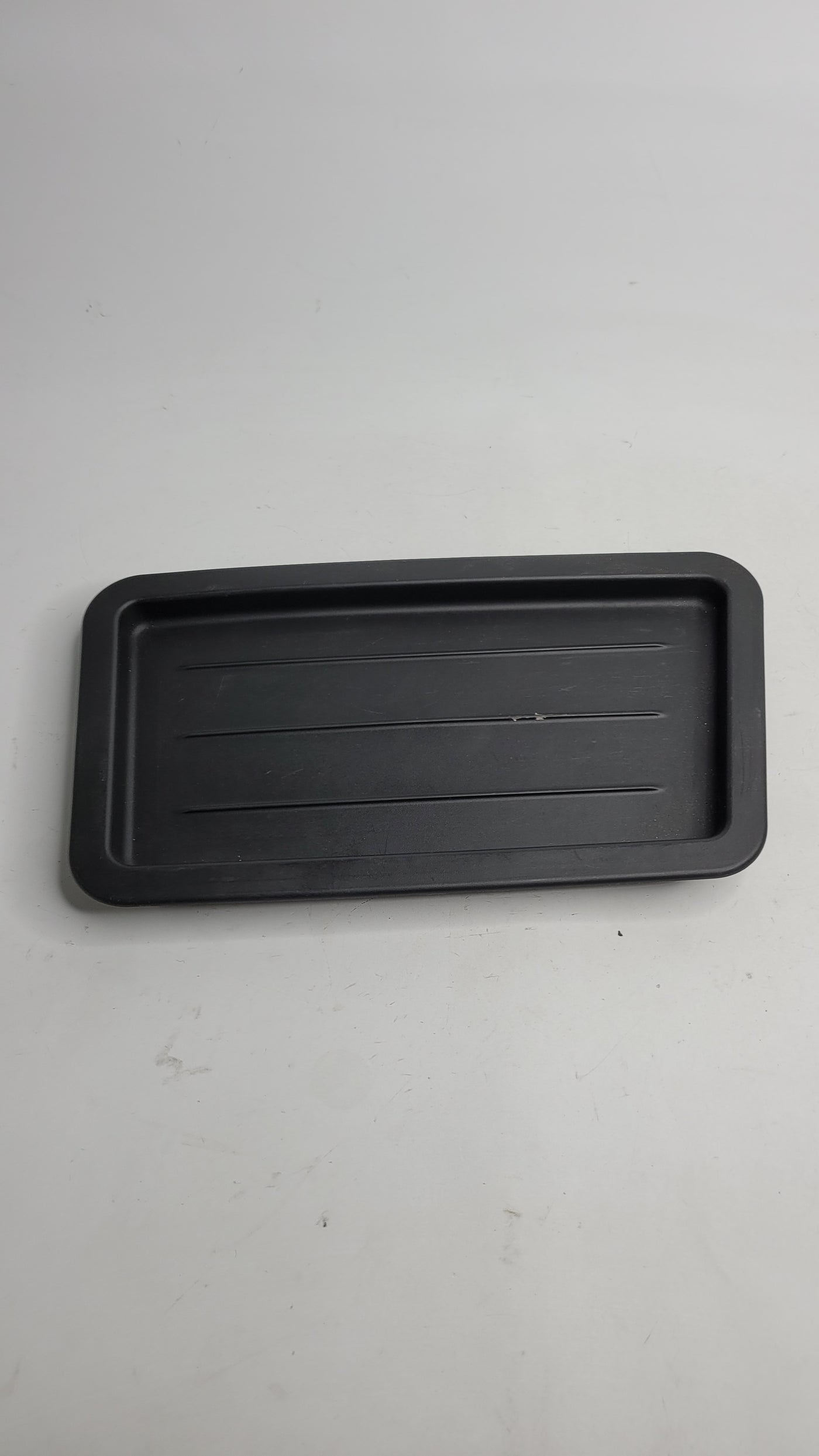 F80 M3 and F82 M4 storage tray flat insert mat in black, designed for luggage compartment organization by MPerformance.parts.