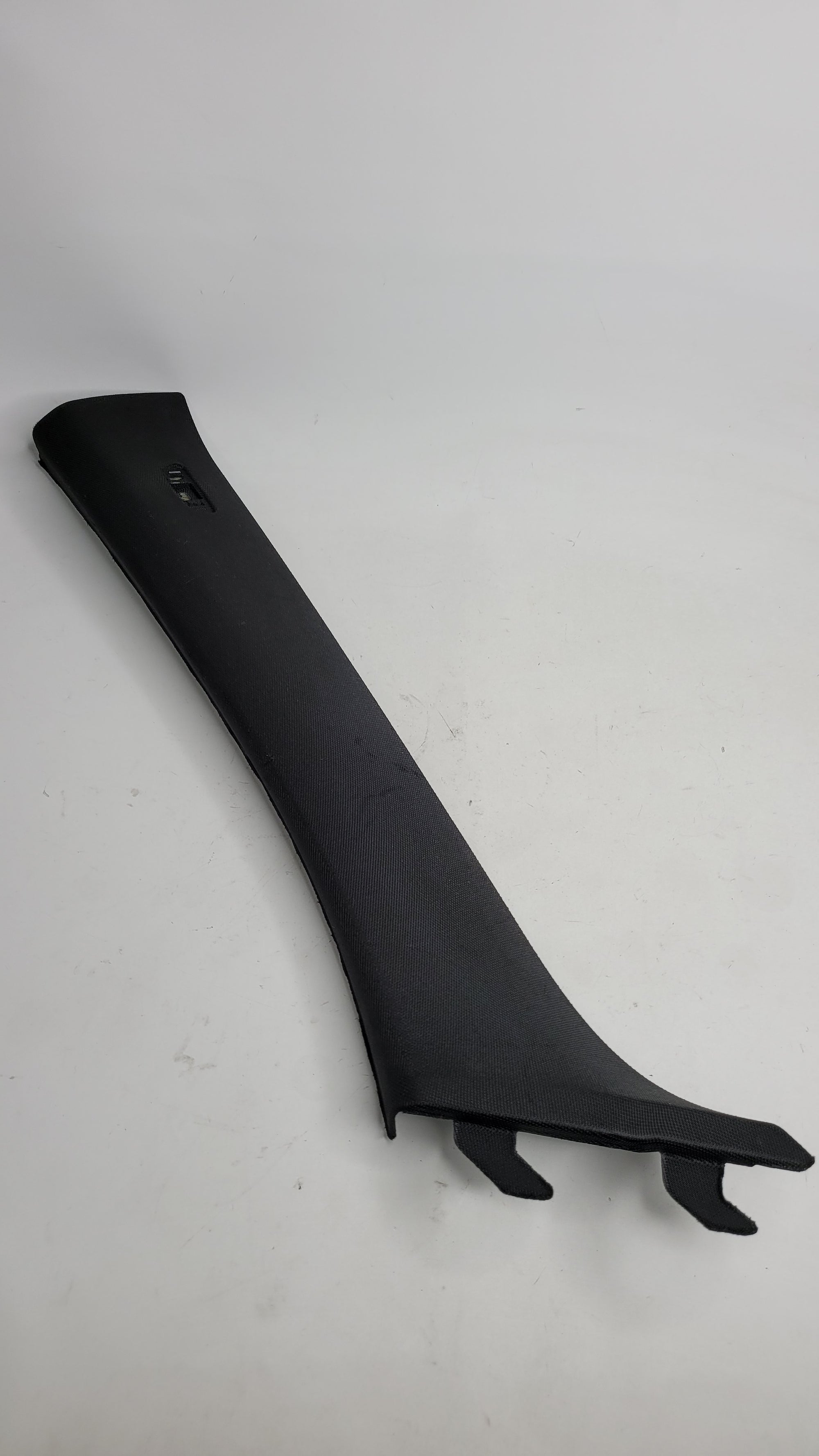 BMW M3 G80 M3 xDrive front left upper A-pillar trim in black with mounting clips, part number 7433239.
