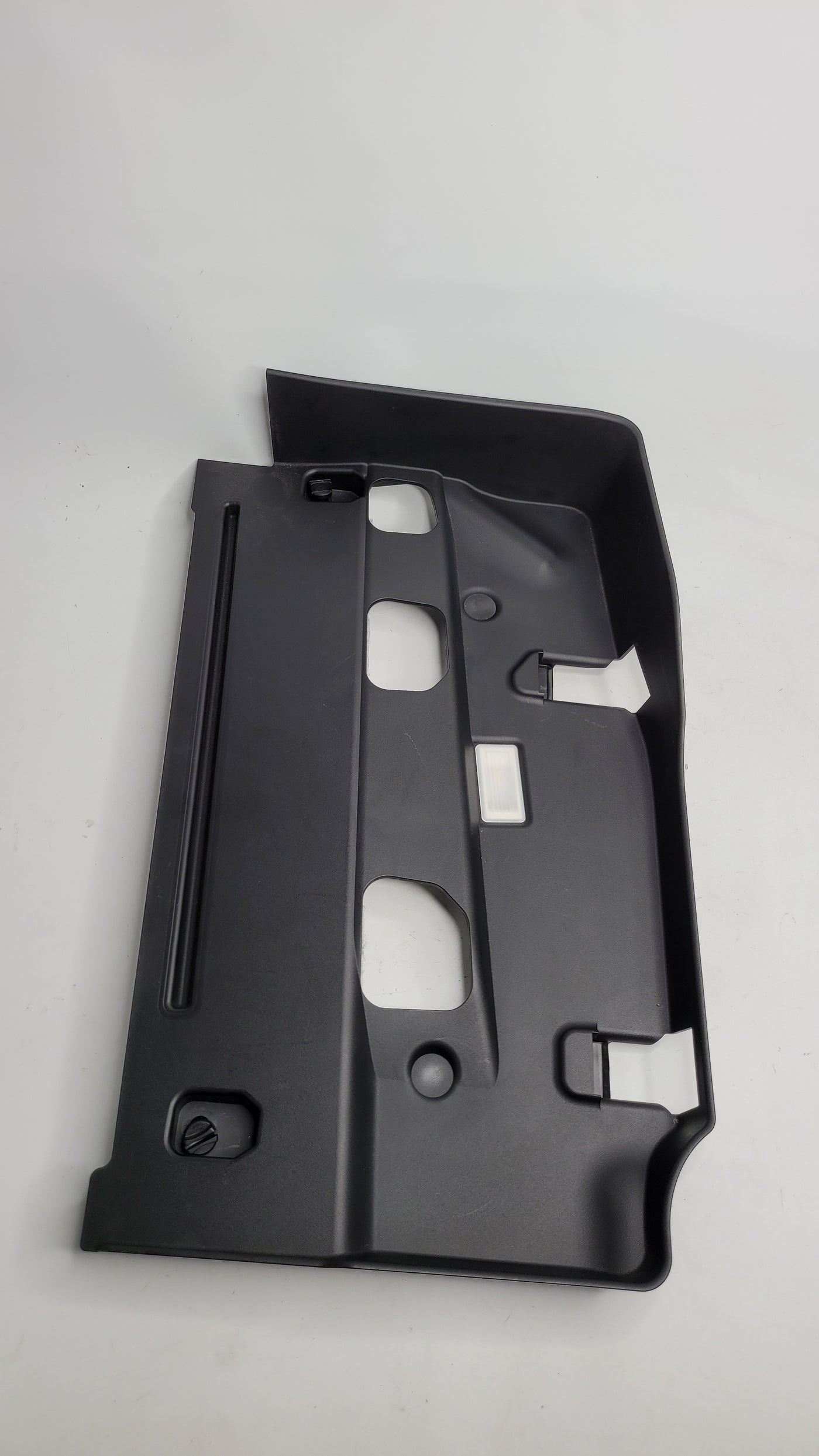 BMW M3 G80 left passenger side lower dashboard trim in black, featuring a sleek design and precise fit for interior enhancement.