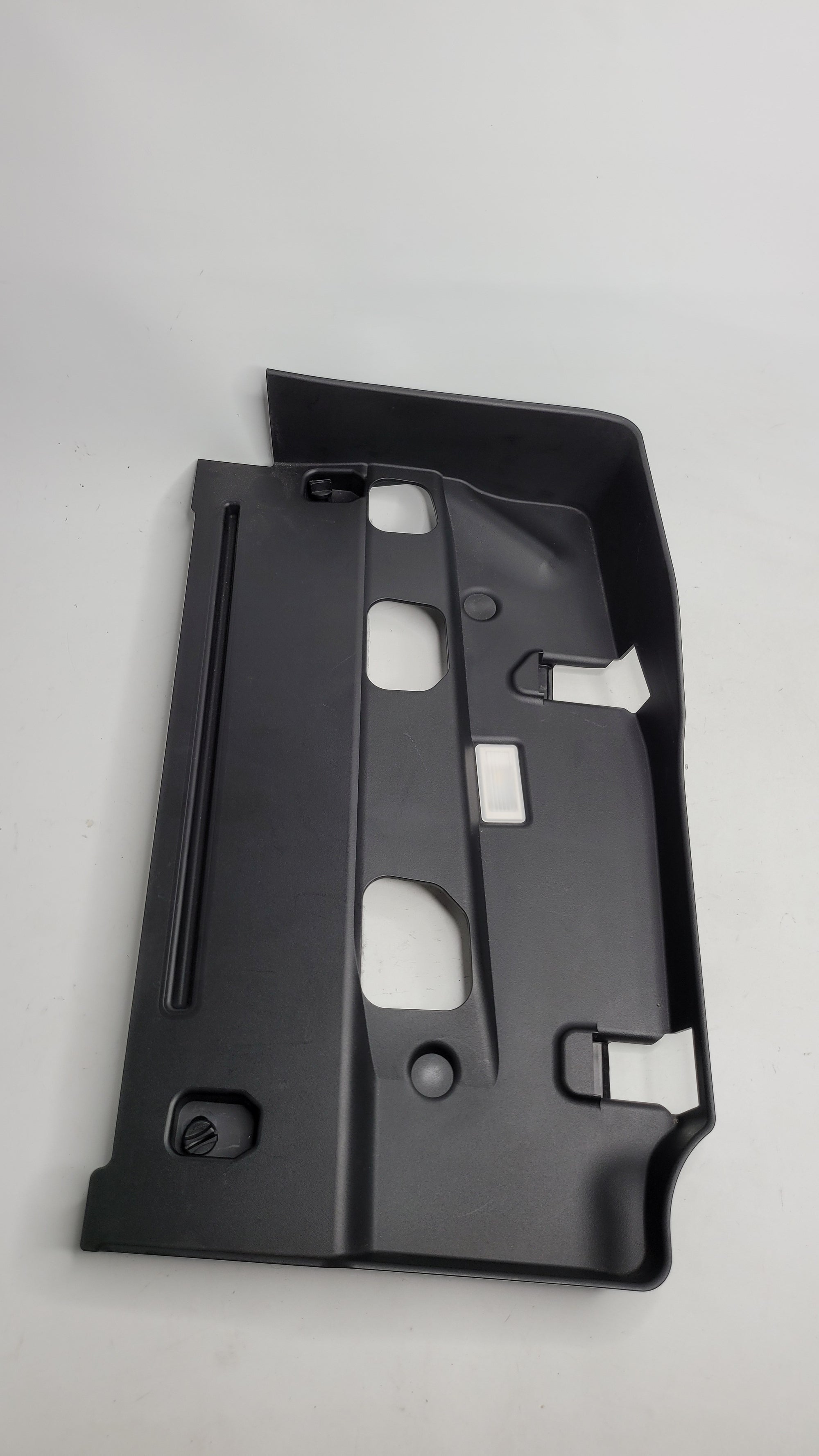BMW M3 G80 left passenger side lower dashboard trim in black, featuring a sleek design and precise fit for interior enhancement.