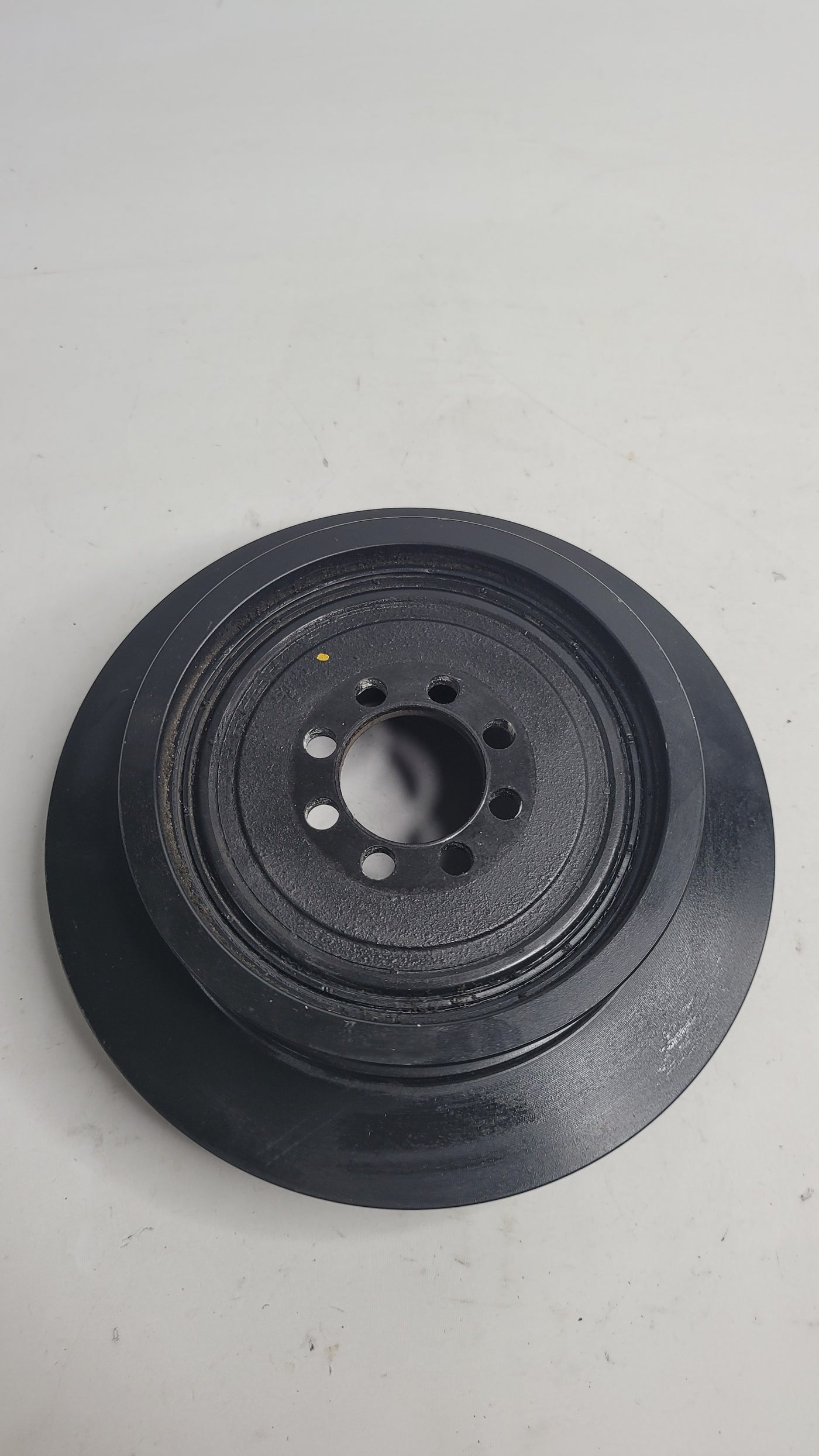 BMW F80 M3 F82 M4 S55 vibration damper crankshaft pulley by MPerformance.parts, showing the black metal pulley with mounting details.