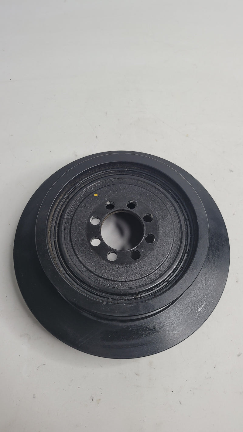 BMW F80 M3 F82 M4 S55 vibration damper crankshaft pulley by MPerformance.parts, showing the black metal pulley with mounting details.