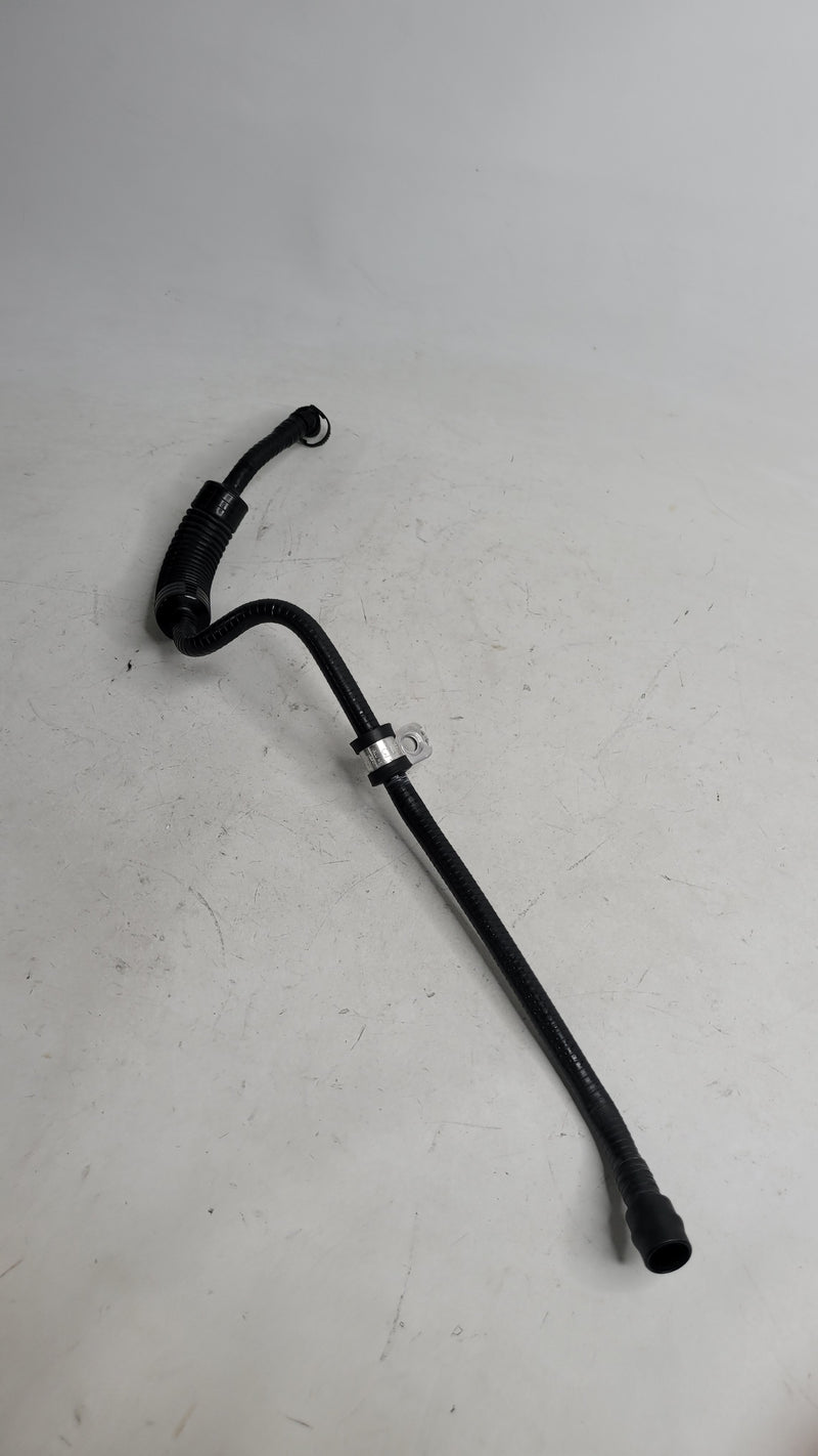 BMW vacuum line hose pipe 140327 from MPerformance.parts, showing a black rubber hose with connectors on a white background.