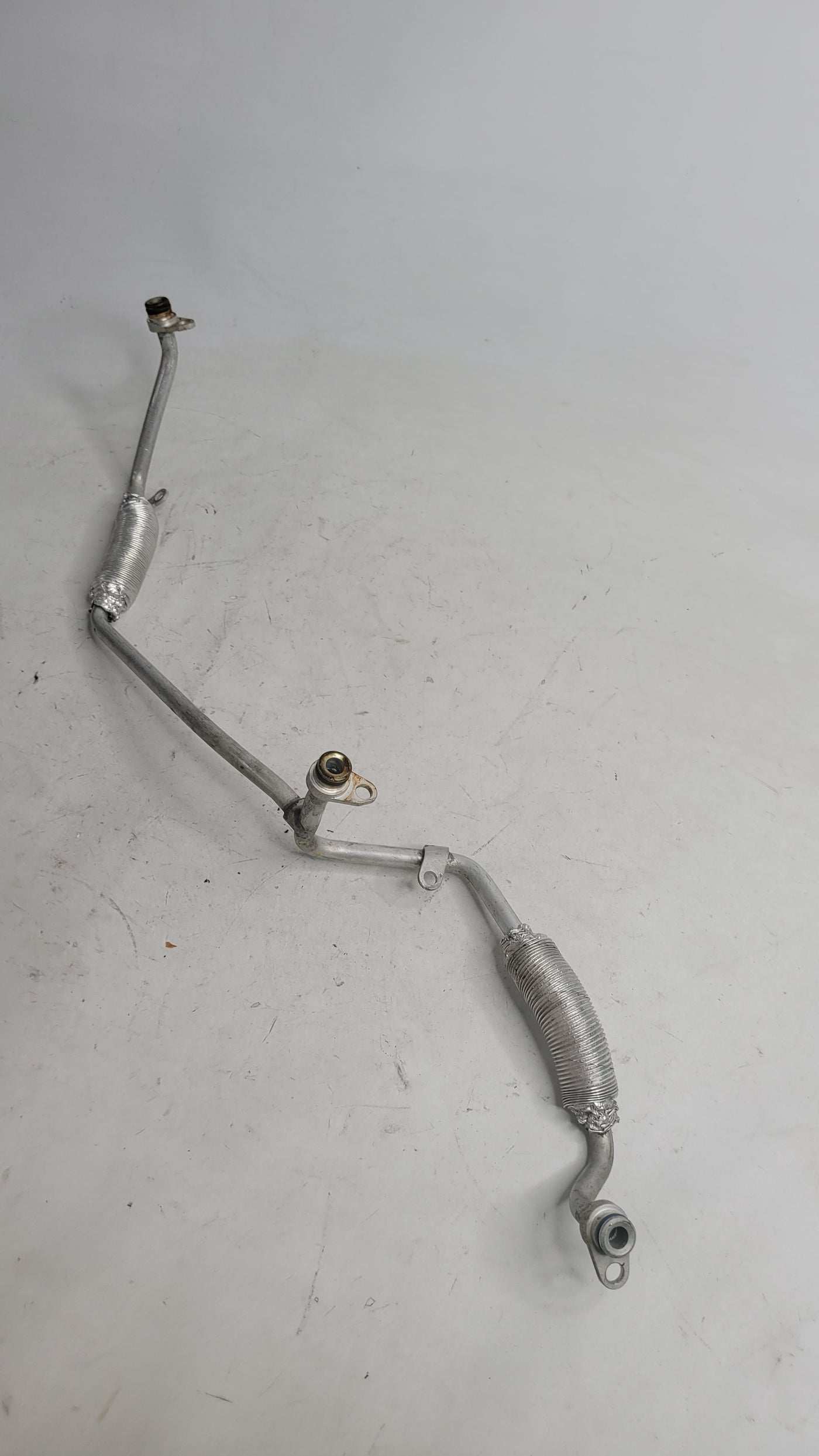 BMW turbocharger-coolant pump line for 2015-2020 models, part 11-53-7-848-507, from MPerformance.parts, shown in the image.