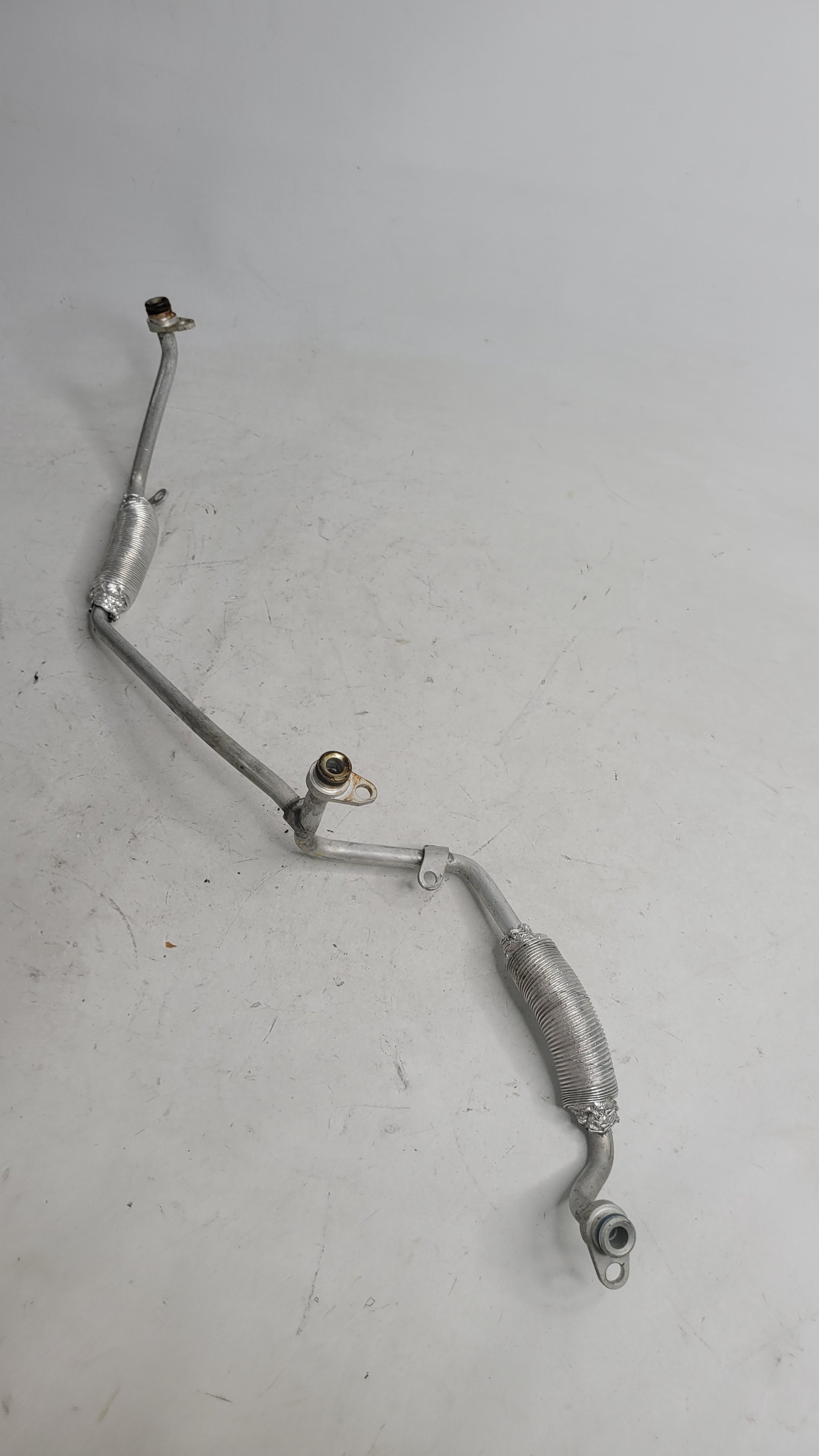 BMW turbocharger-coolant pump line for 2015-2020 models, part 11-53-7-848-507, from MPerformance.parts, shown in the image.