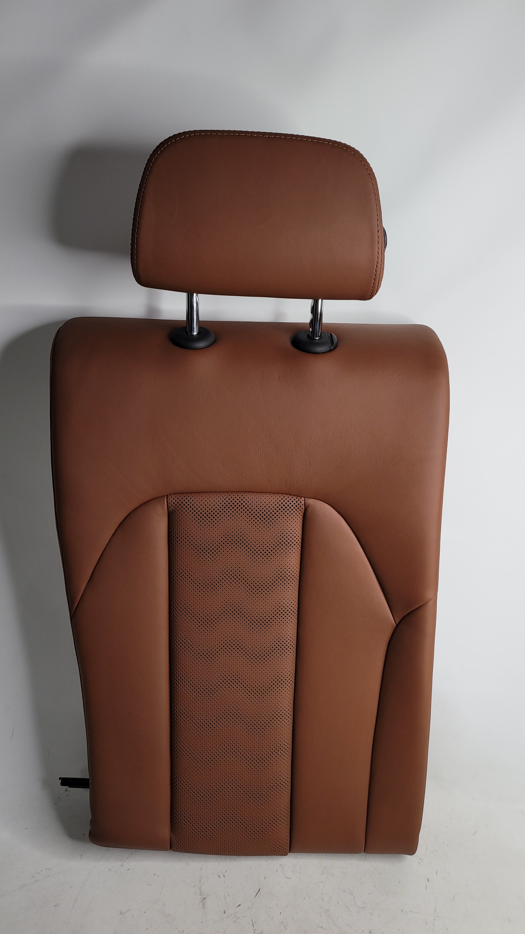 2023 BMW M3 Competition XDrive G80 OEM Tartufi leather rear seat assembly with detailed stitching and design.