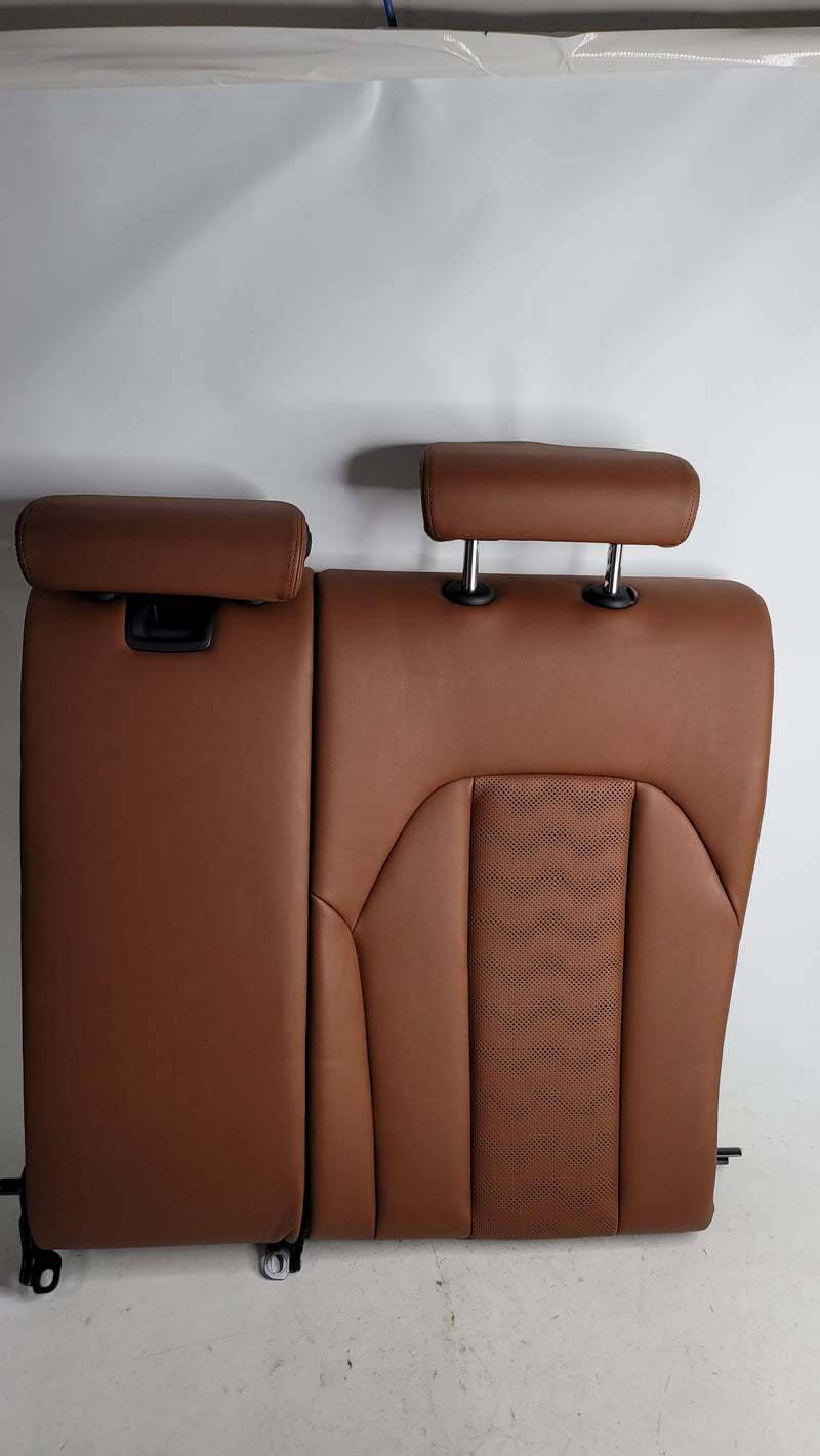 2023 BMW M3 Competition G80 rear seat assembly in Tartufo leather, showing the luxurious upholstery and design details.