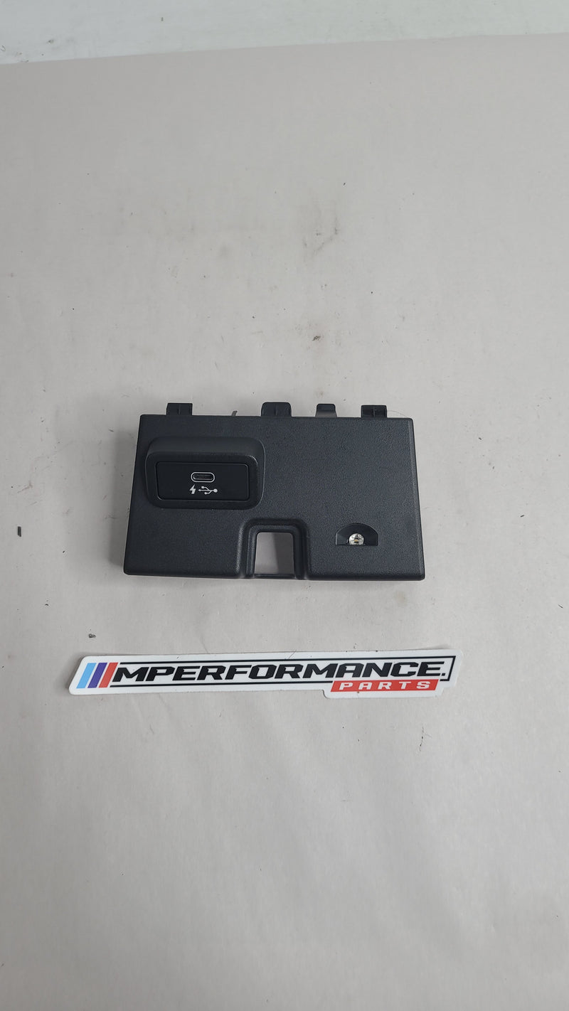 BMW G80 M3 USB-C port connector and surround, genuine MPerformance.parts, close-up view of the car’s interior component.