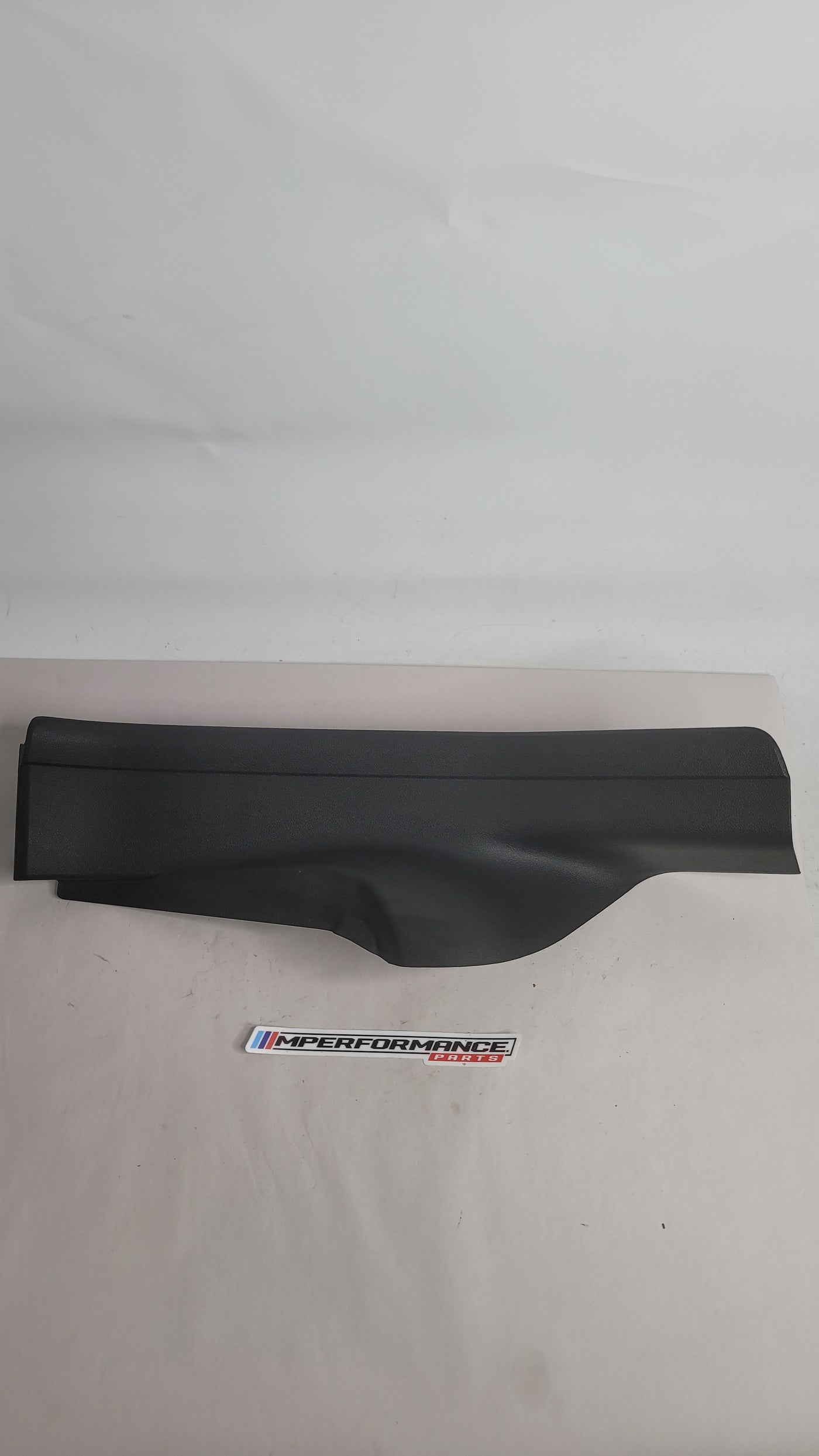BMW 3 Series rear left door trim panel for G80 M3, 2018-2024, showing textured surface and mounting details.