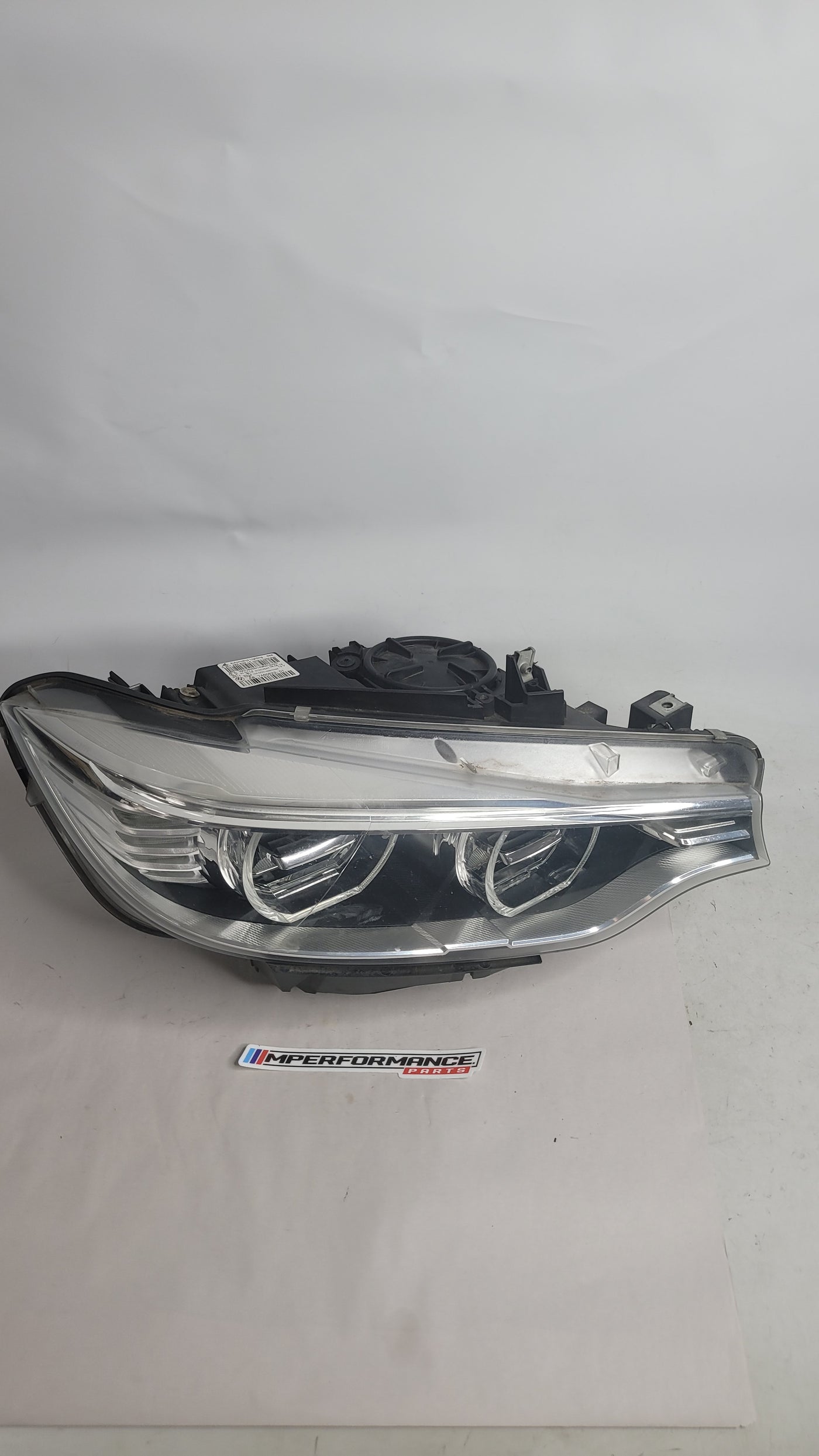 BMW M4 F82 F83 driver side front headlight with LED AHL headlight assembly, part number 7460622-01, from MPerformance.parts.