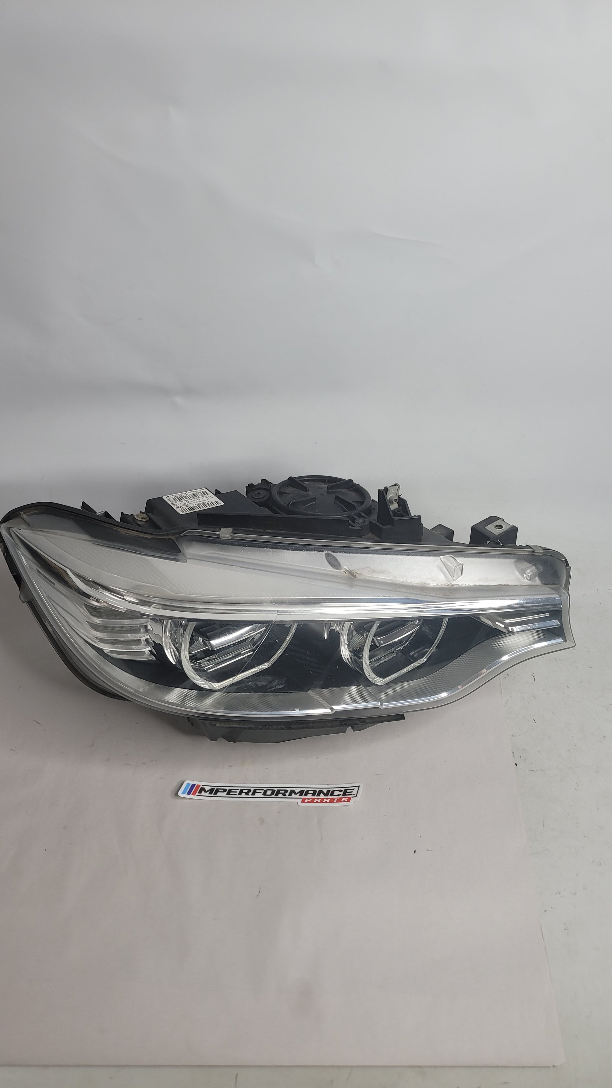 BMW M4 F82 F83 driver side front headlight with LED AHL headlight assembly, part number 7460622-01, from MPerformance.parts.